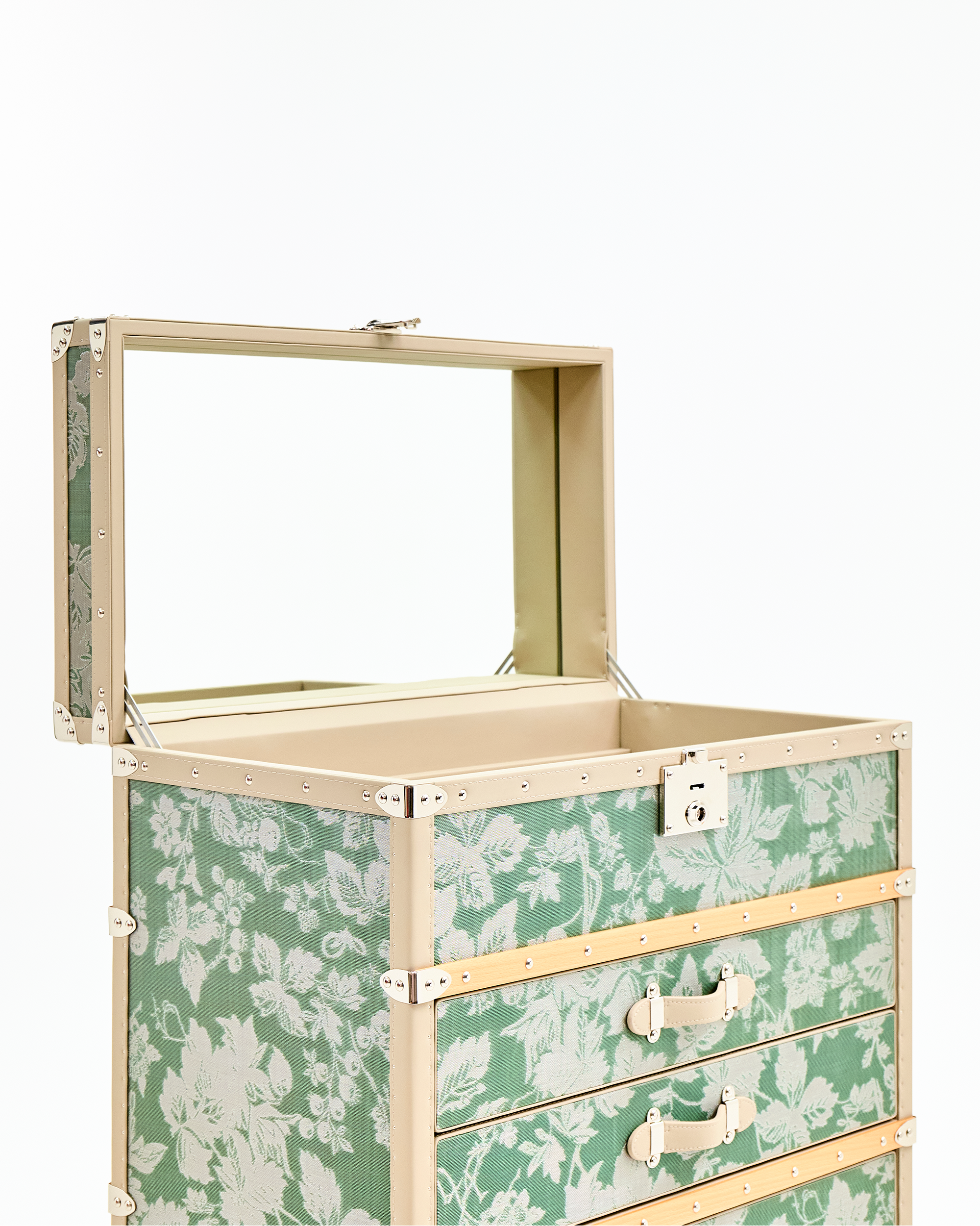 Velvet-lined interior of the SIRAE Aurum Loom oasis green jewelry trunk, styled for luxury storage