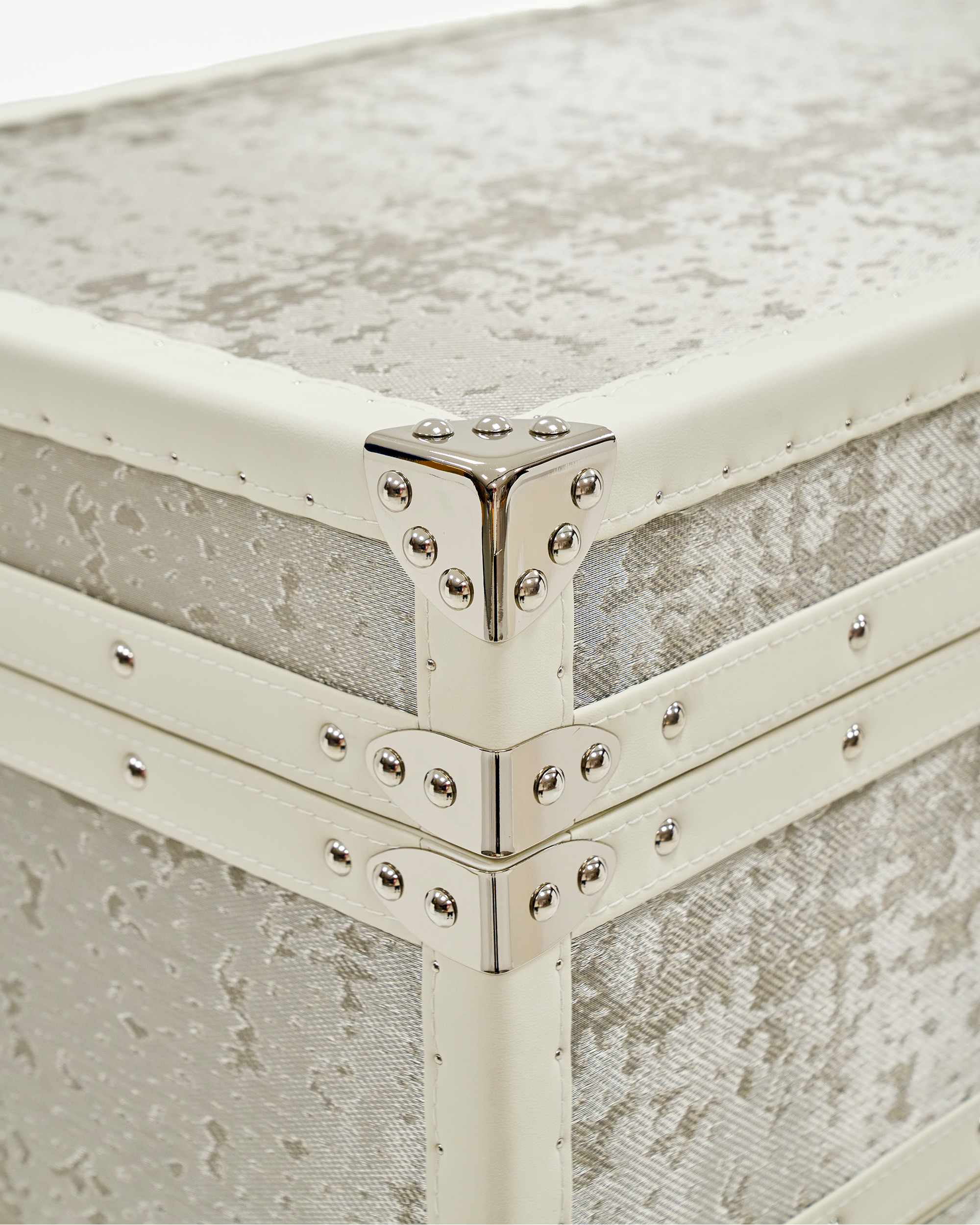 Velvet-lined interior of the SIRAE Aurum Loom pearl white jewelry trunk, styled for luxury storage