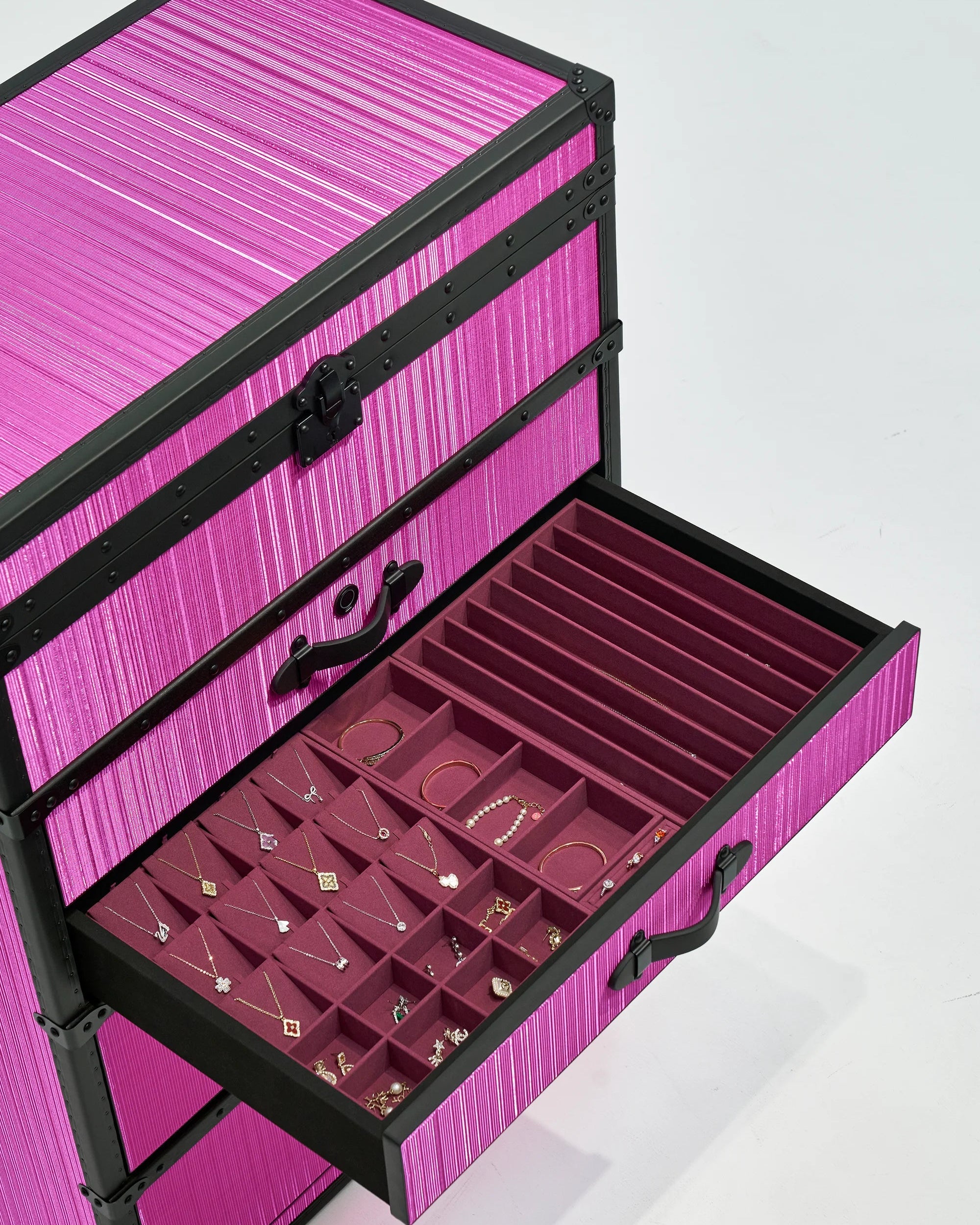 Side view of the SIRAE Aurum Loom rose mirage jewelry trunk in a luxury Dubai setting