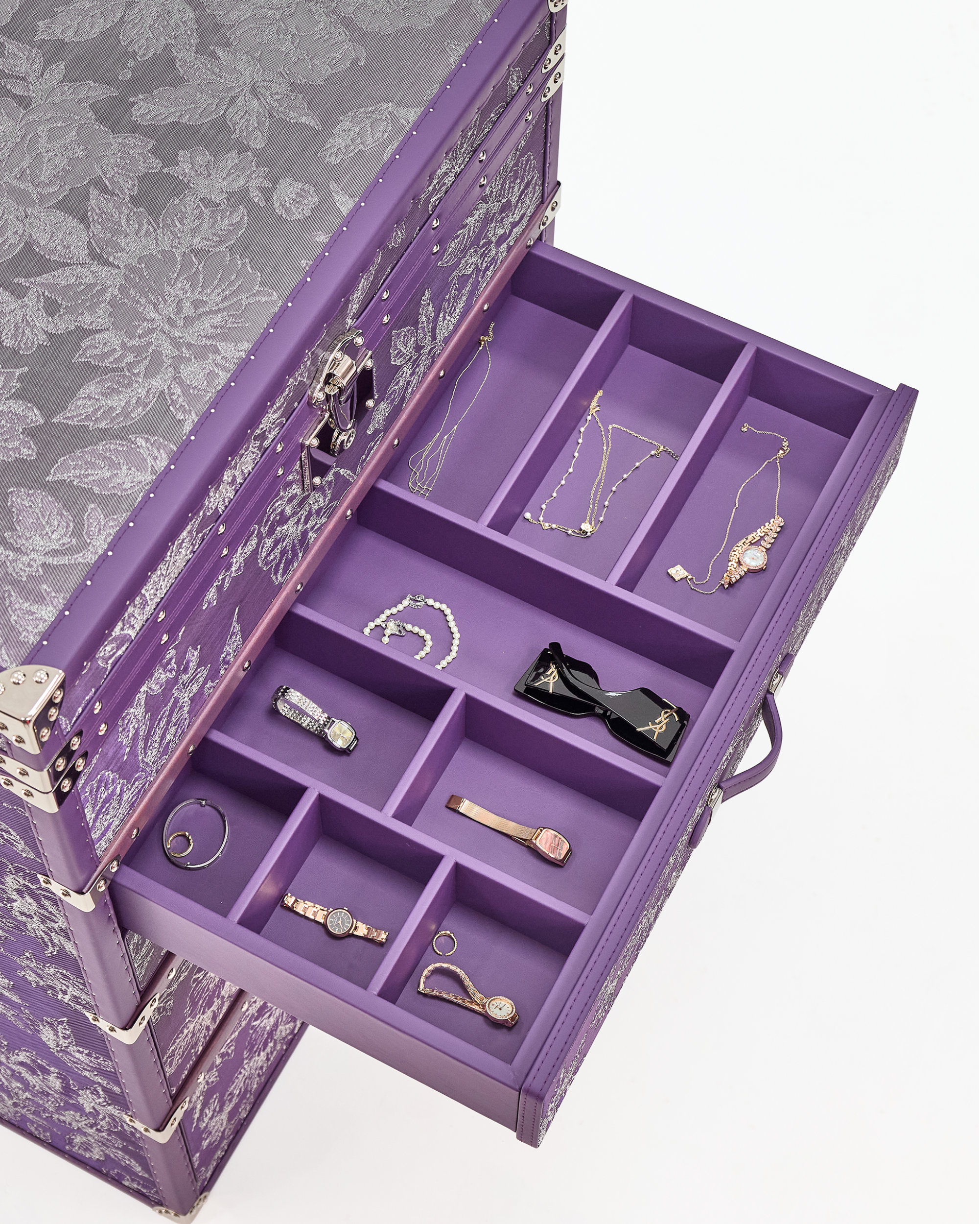Side view of the SIRAE Aurum Loom royal amethyst jewelry trunk in a luxury Dubai setting