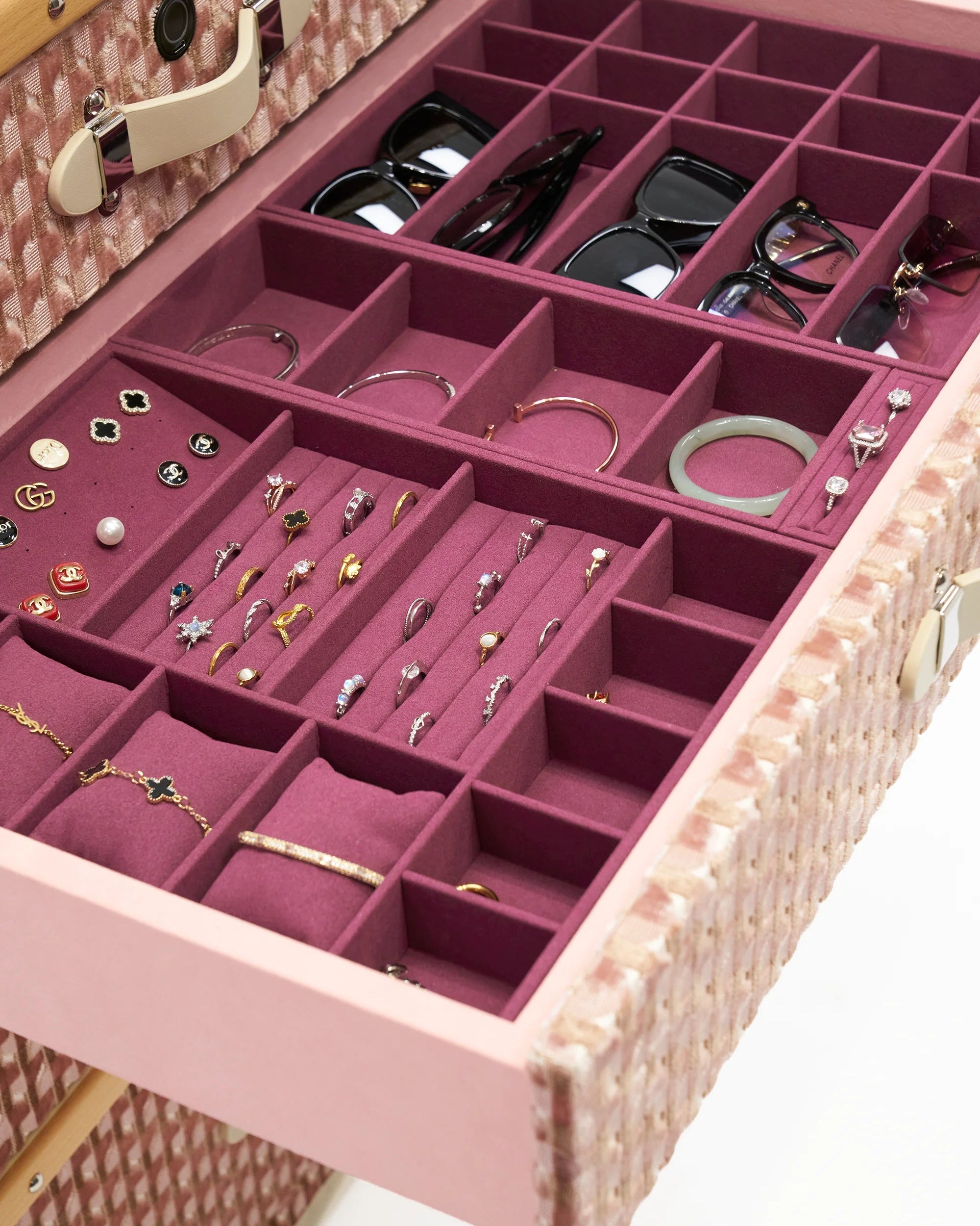 Velvet-lined interior of the SIRAE Ciselé Velvet blush atelier jewelry trunk, styled for luxury storage
