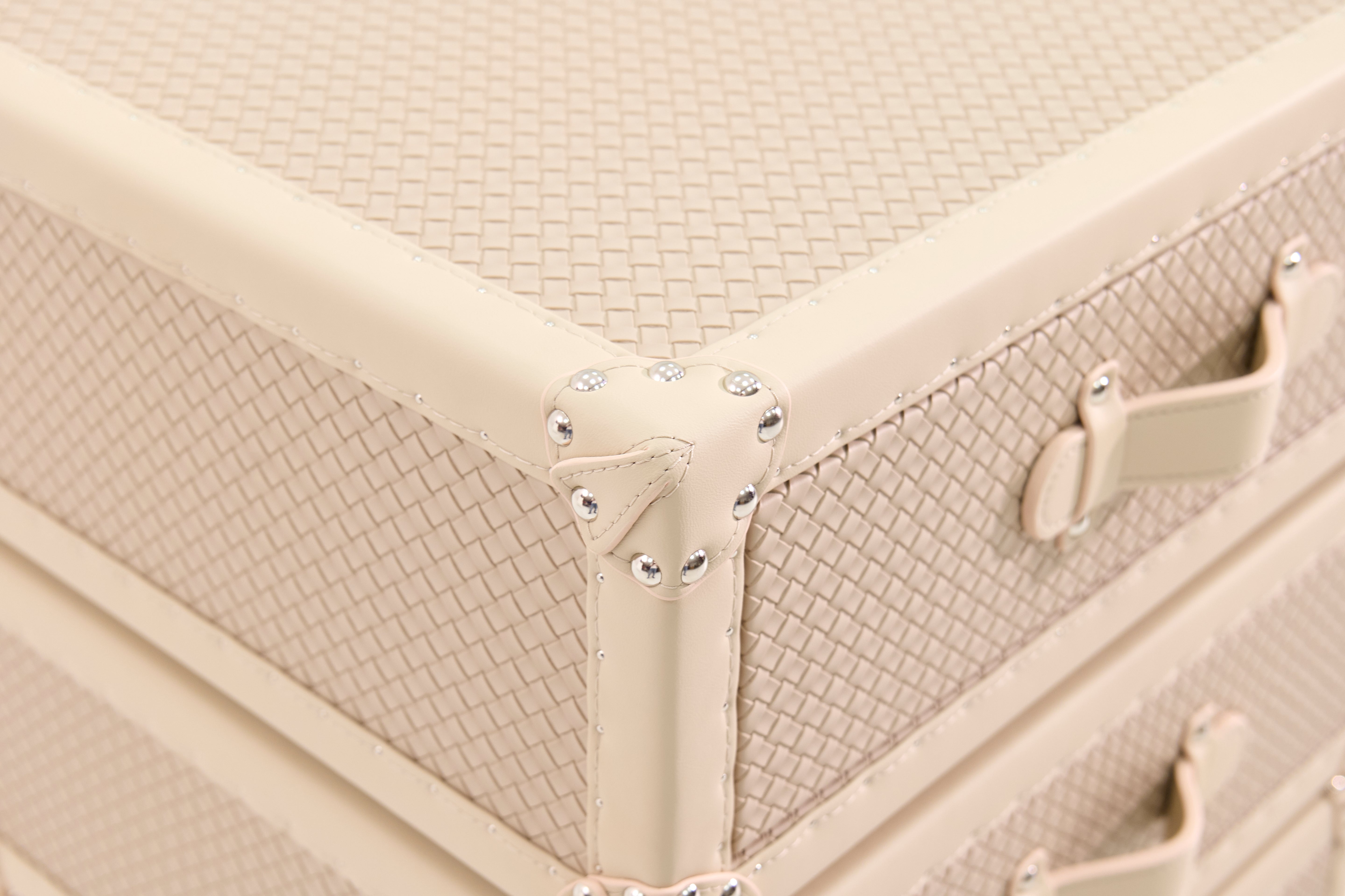 SIRAE Cuir Luxe cream rotating cabinet styled with jewelry in a luxury Dubai interior