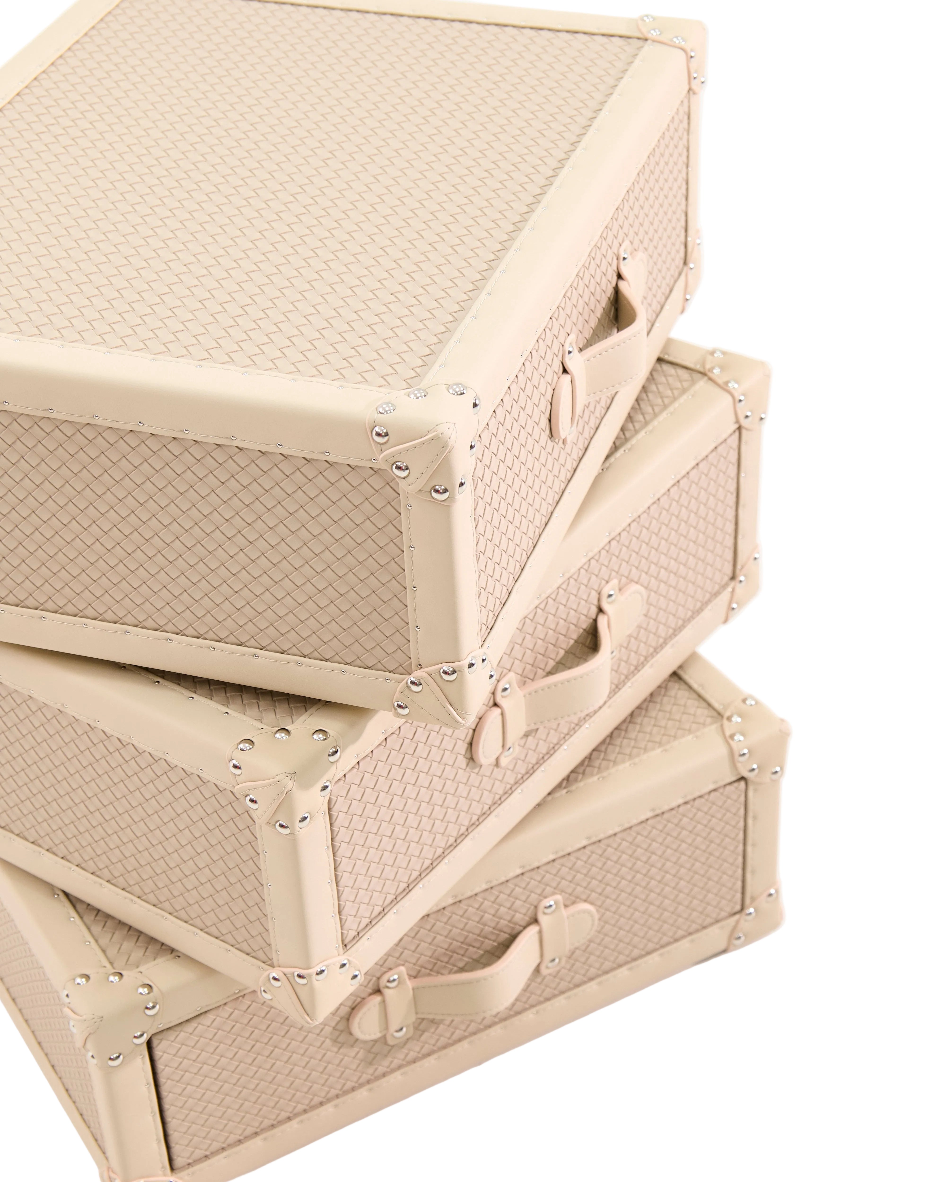 Embossed leather texture detail on the SIRAE cream rotating cabinet