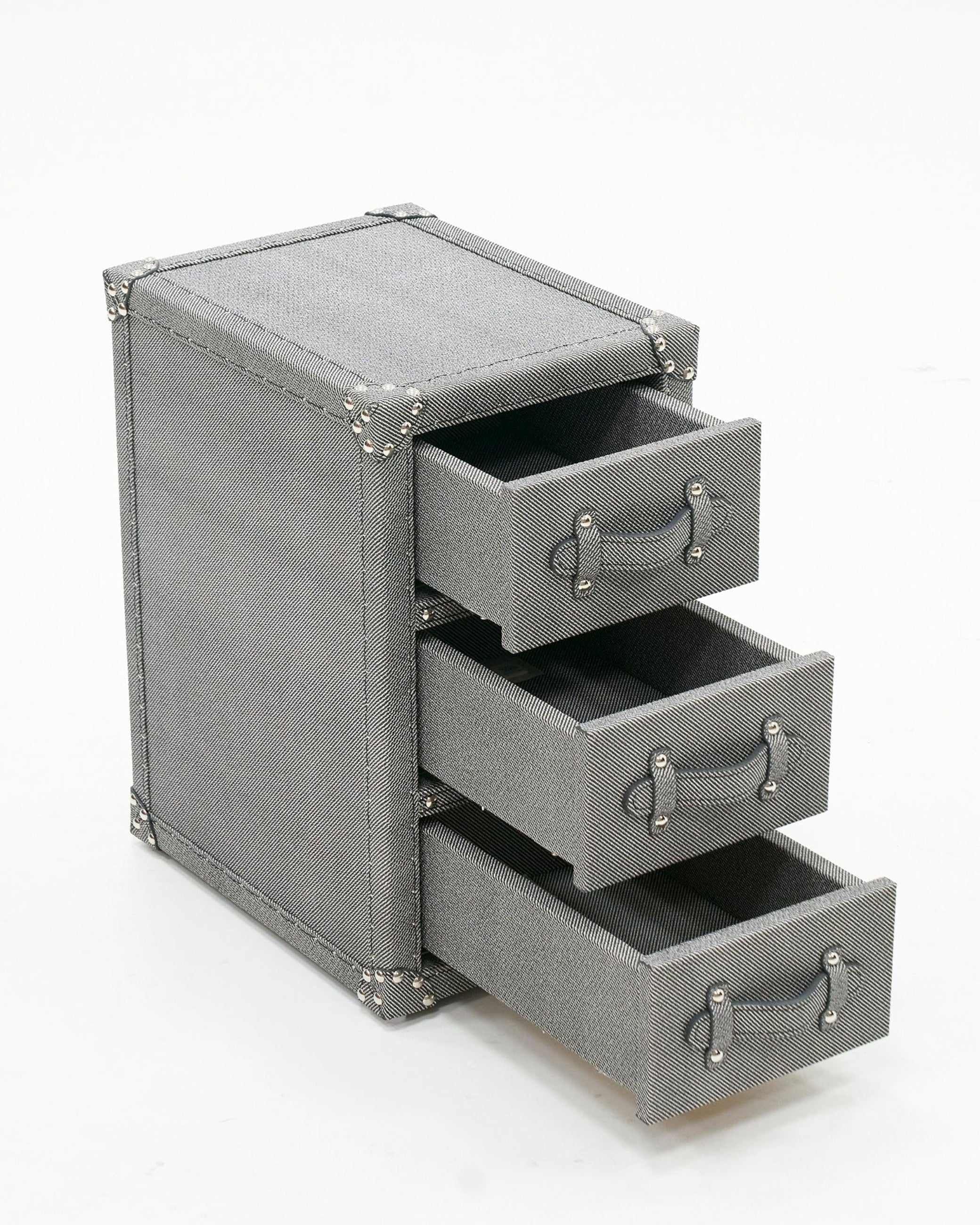 Microfiber leather texture detail on the SIRAE grey compact storage