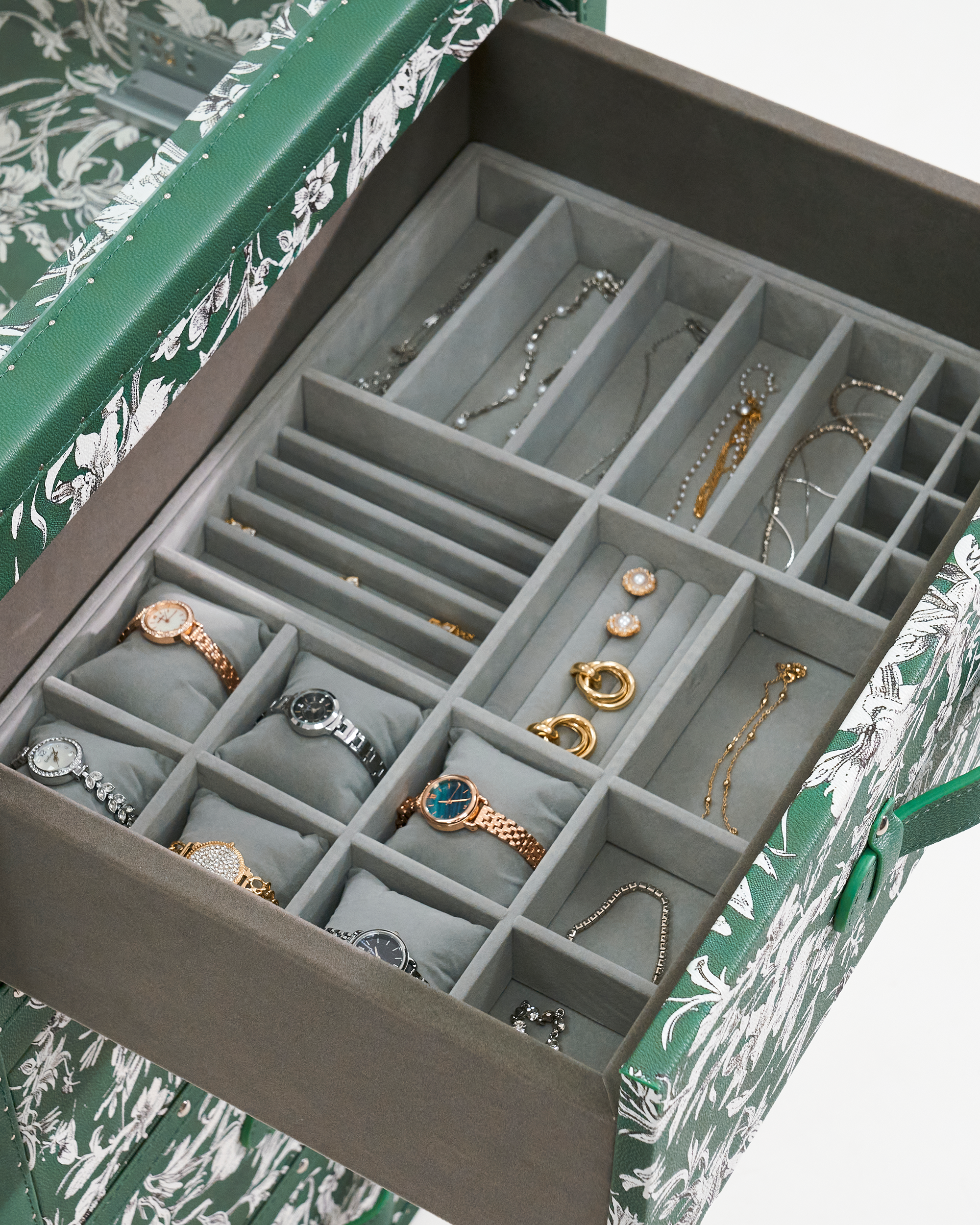 SIRAE Heritage Luxe meadow floral multi-function cabinet styled with jewelry in a luxury Dubai interior