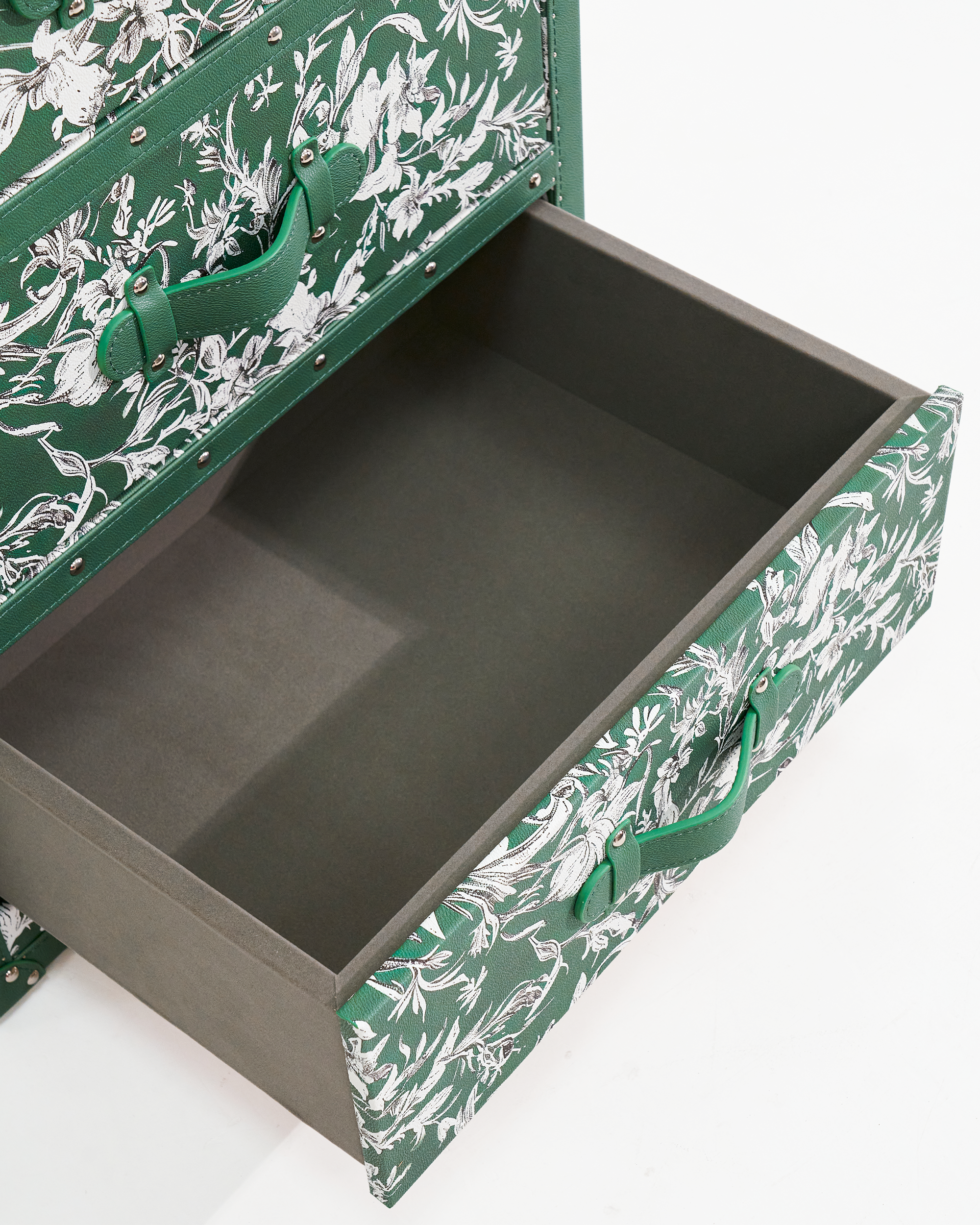 Embossed leather texture detail on the SIRAE meadow floral multi-function cabinet