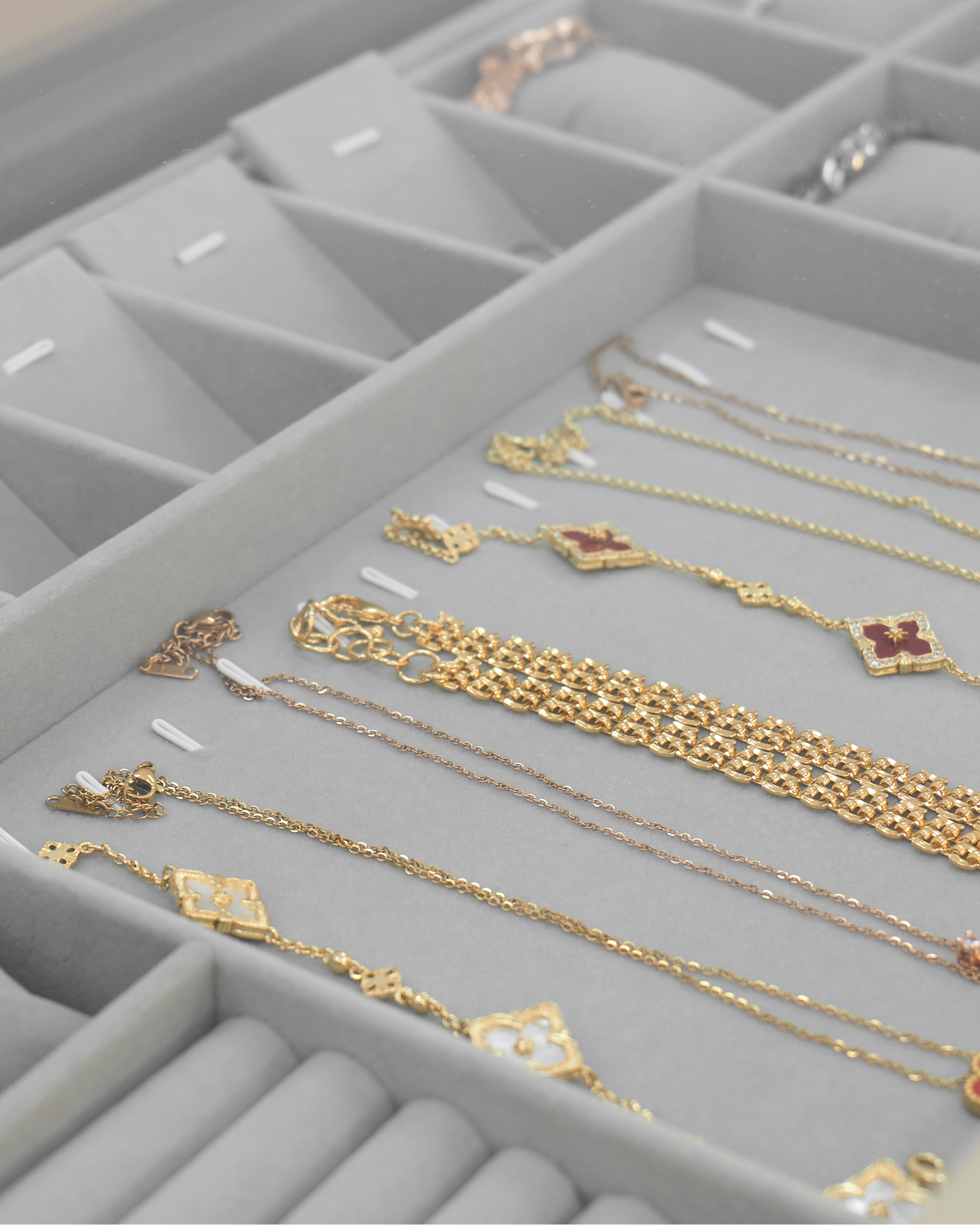 SIRAE Heritage Luxe noir & crème side cabinet styled with jewelry in a luxury Dubai interior