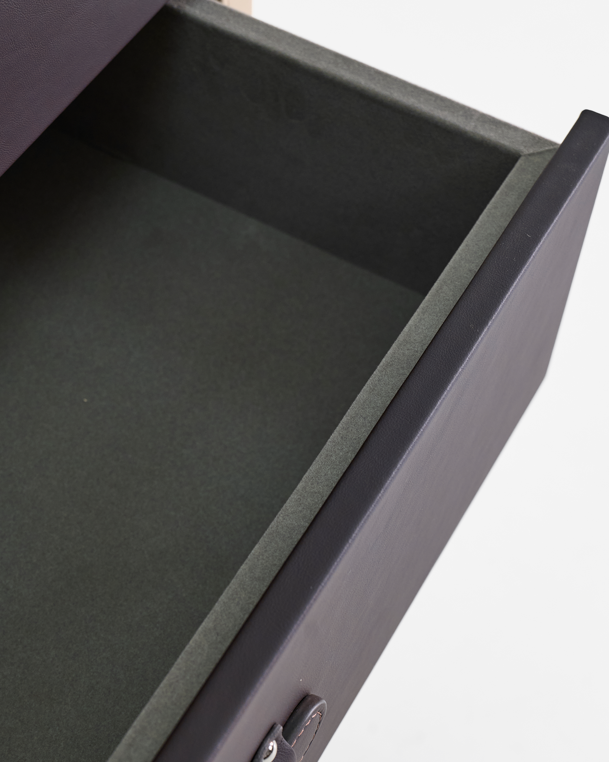 SIRAE Heritage Luxe noir & crème side cabinet styled with jewelry in a luxury Dubai interior