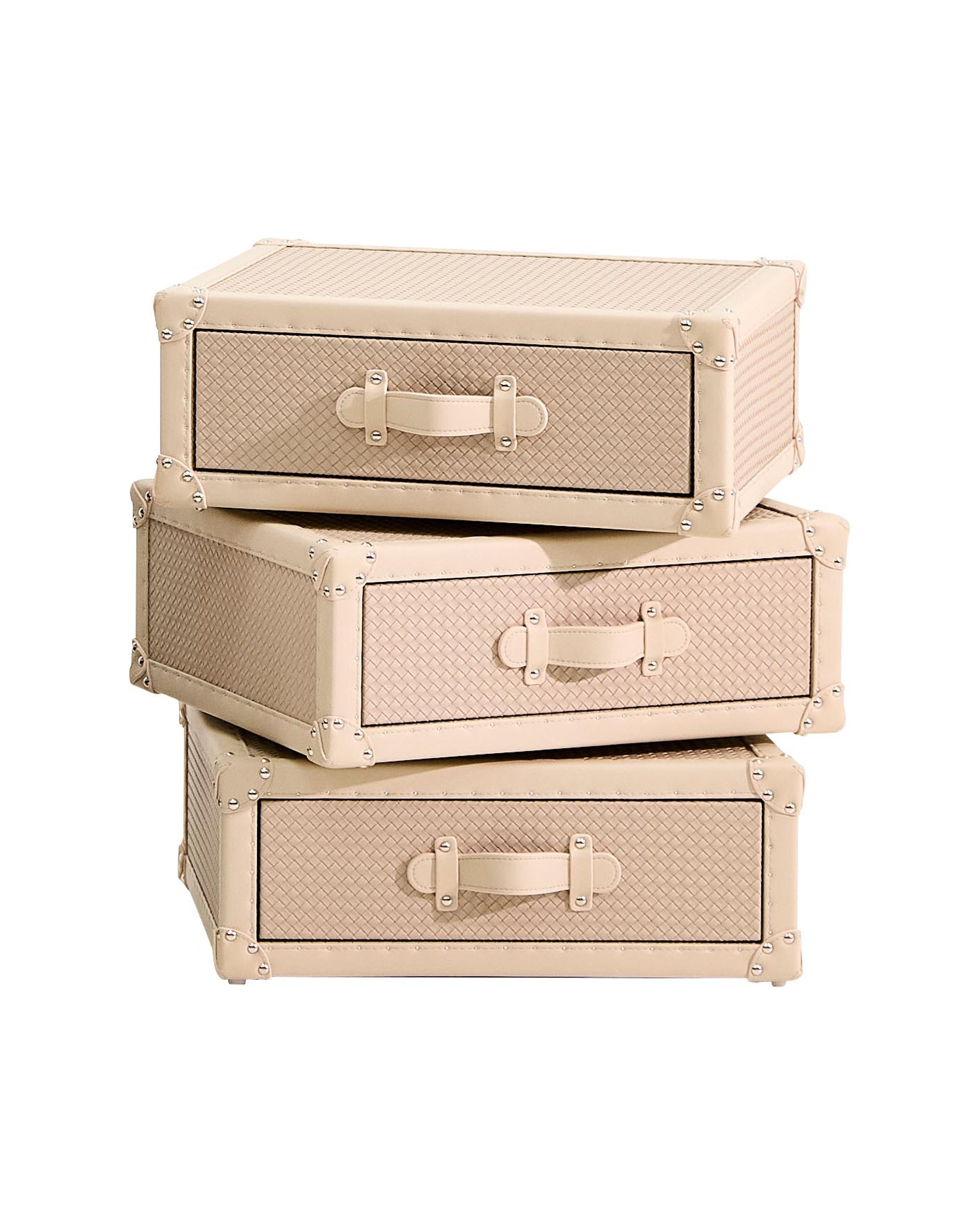 Stack of beige storage boxes with handles on a white background