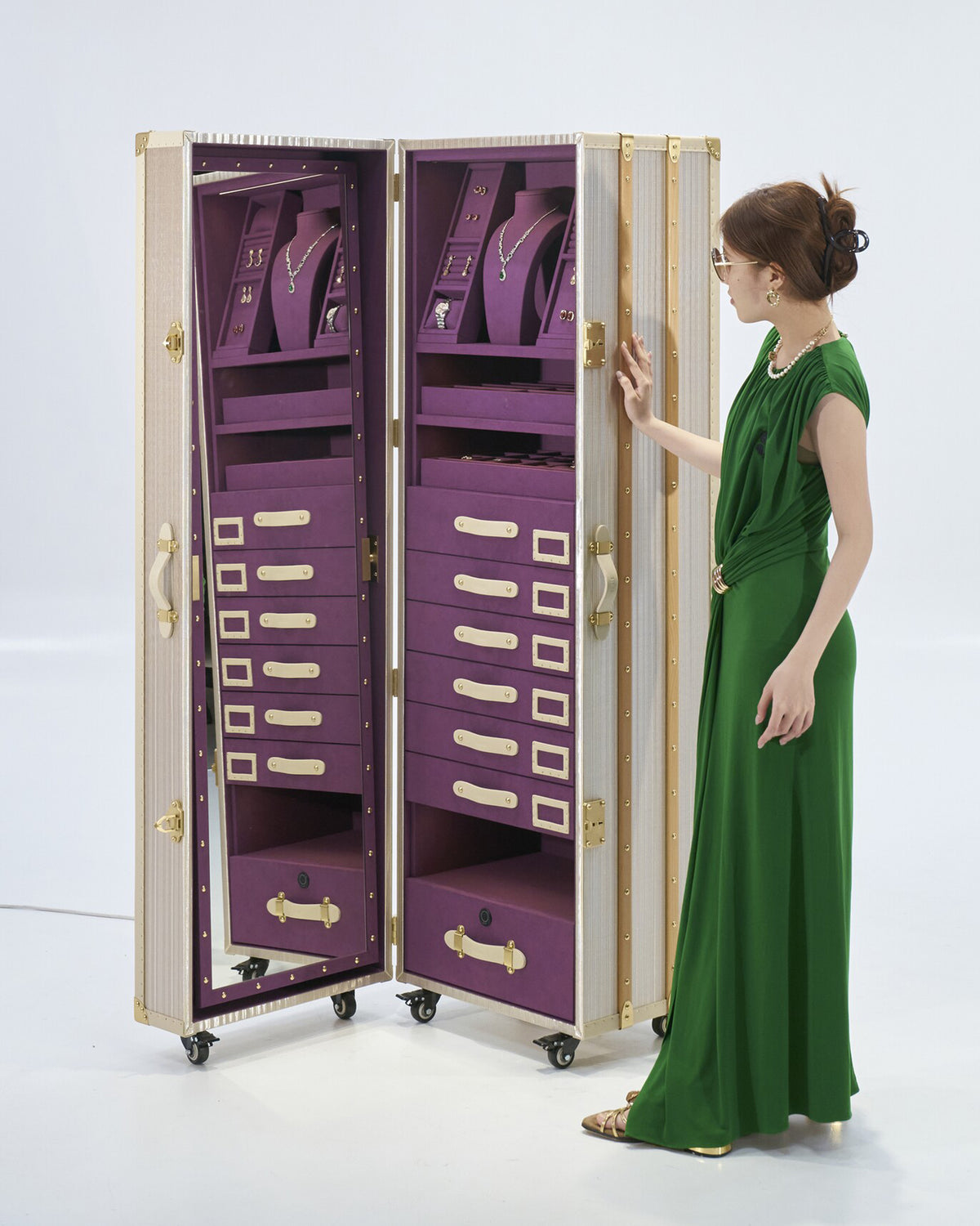 Jewellery armoire shown open with lit amethyst interior, SIRAE Dubai