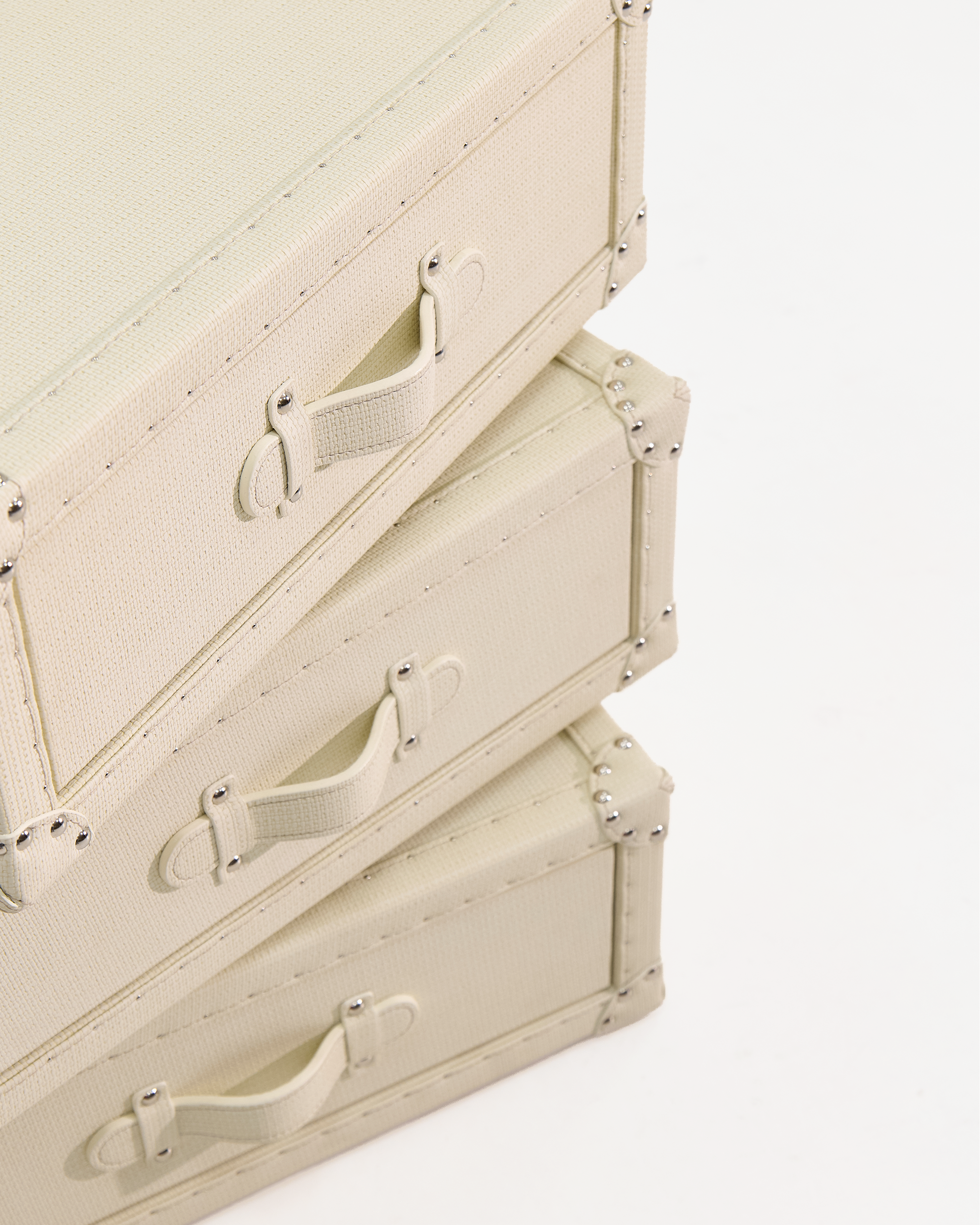 Front view of the beige embossed-leather rotating jewellery cabinet by SIRAE, Dubai