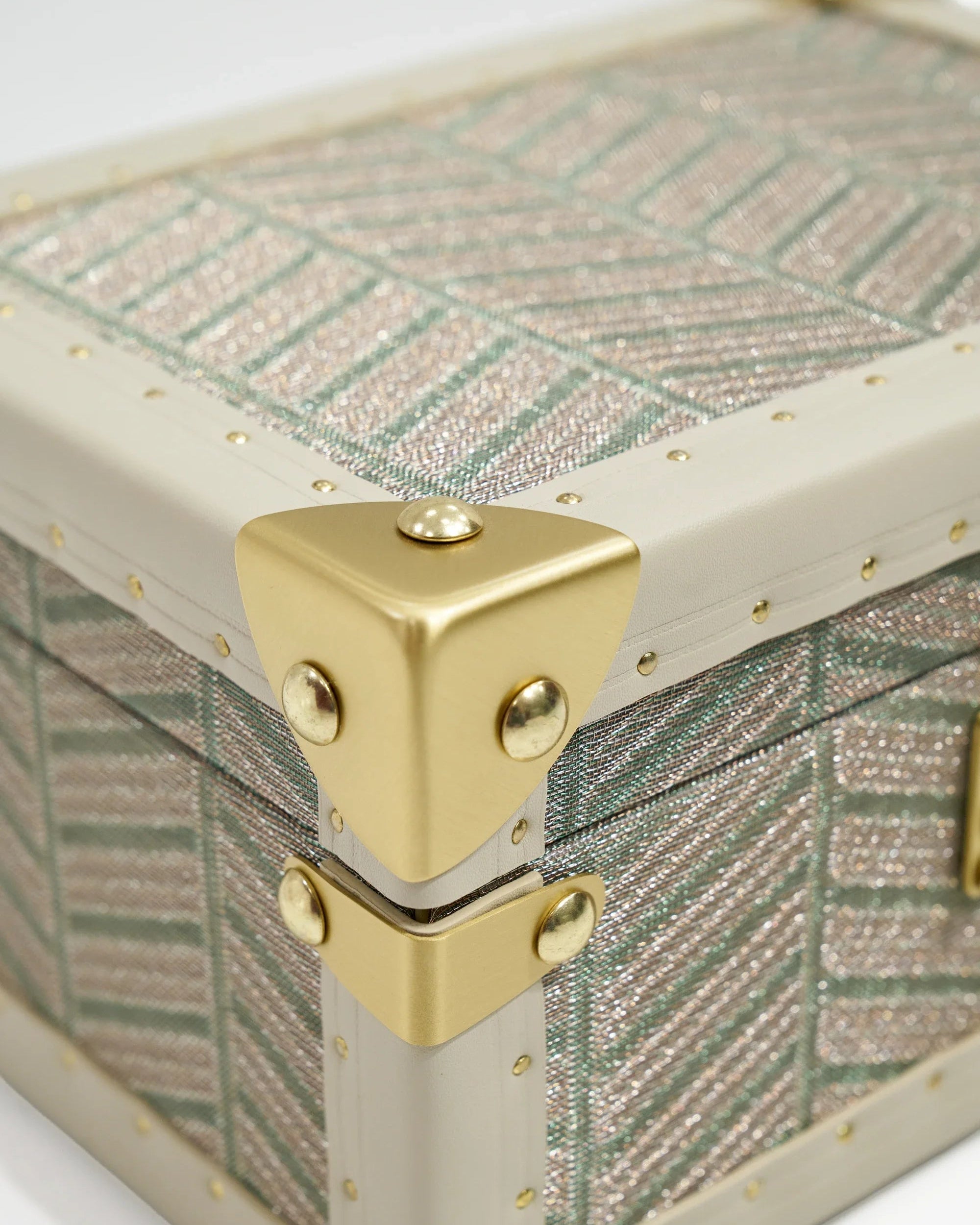 SIRAE Aurum Loom avocado green jewelry box styled with jewelry in a luxury Dubai interior
