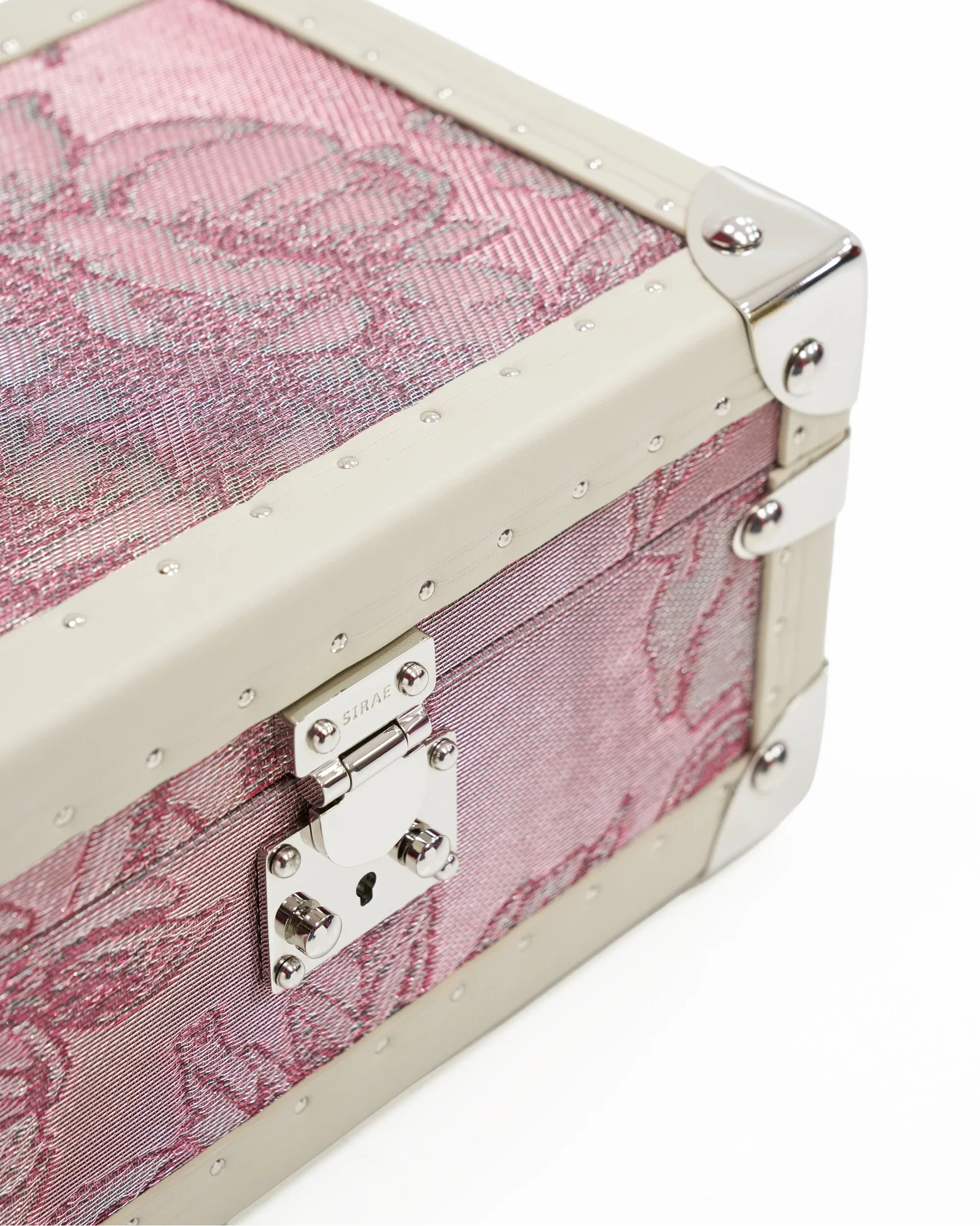 SIRAE Aurum Loom mini pink jewelry box styled with jewelry in a luxury Dubai interior