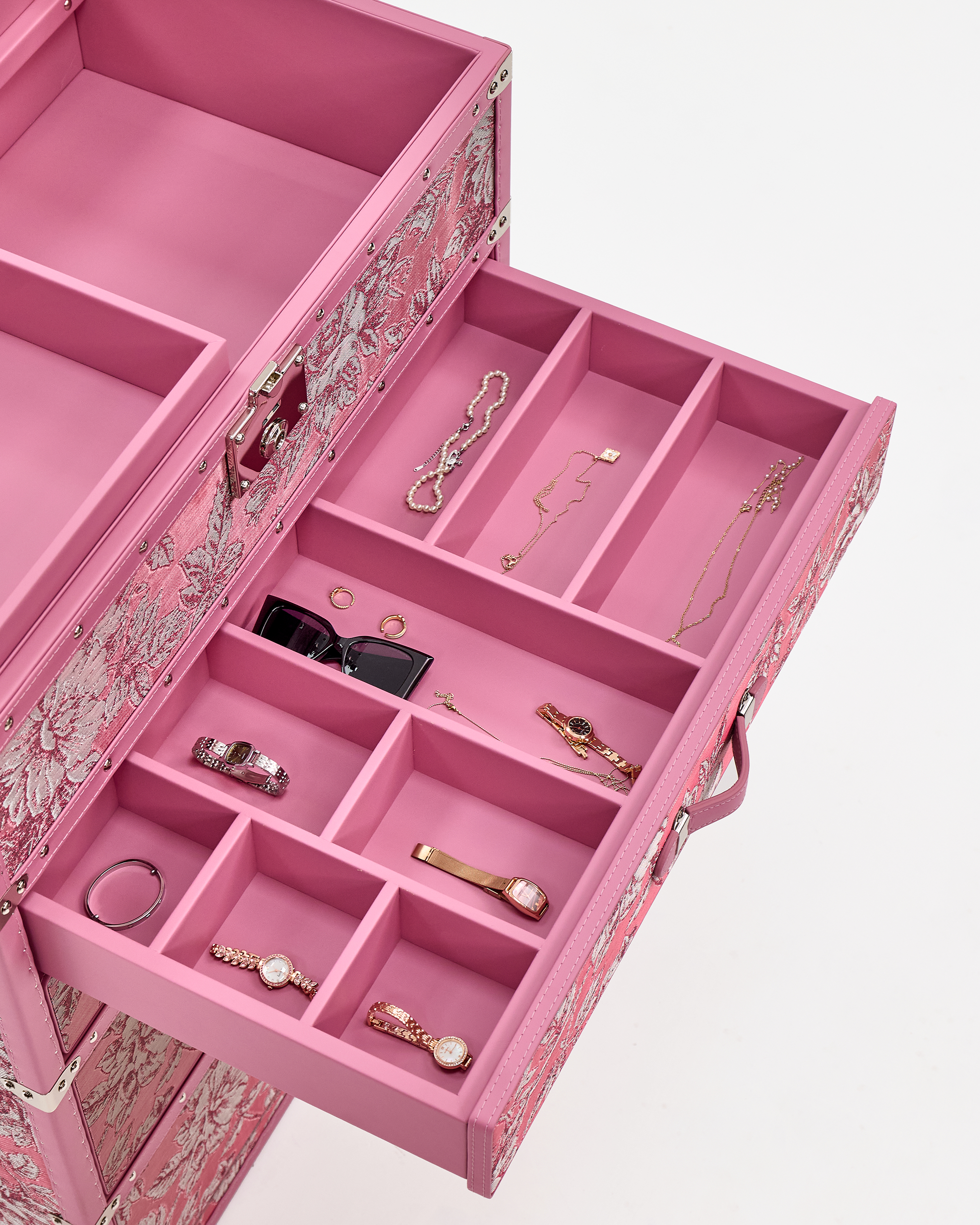 Velvet-lined interior of the SIRAE Aurum Loom blossom pink jewelry trunk, styled for luxury storage