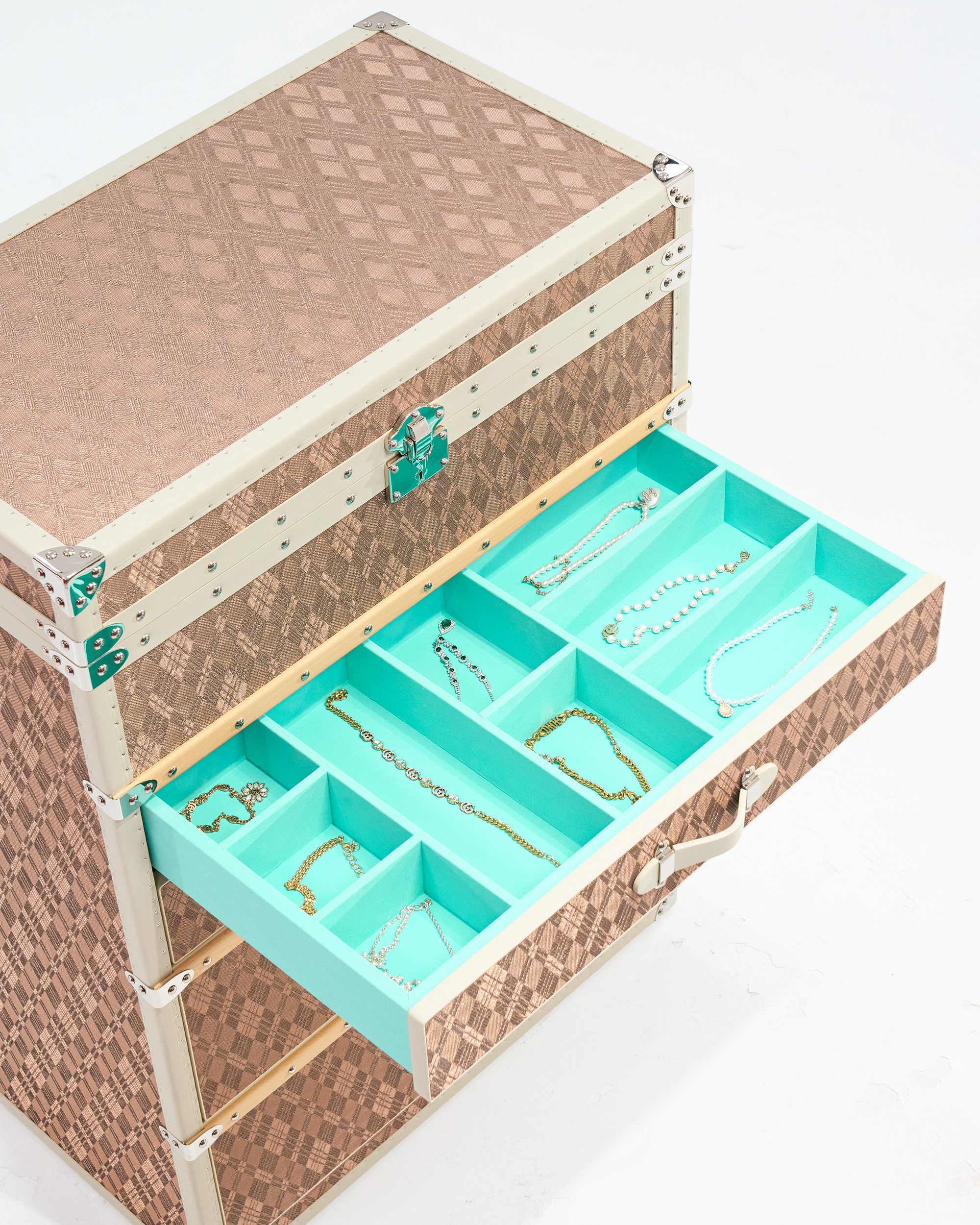 SIRAE Aurum Loom dune gold jewelry trunk styled with jewelry in a luxury Dubai interior