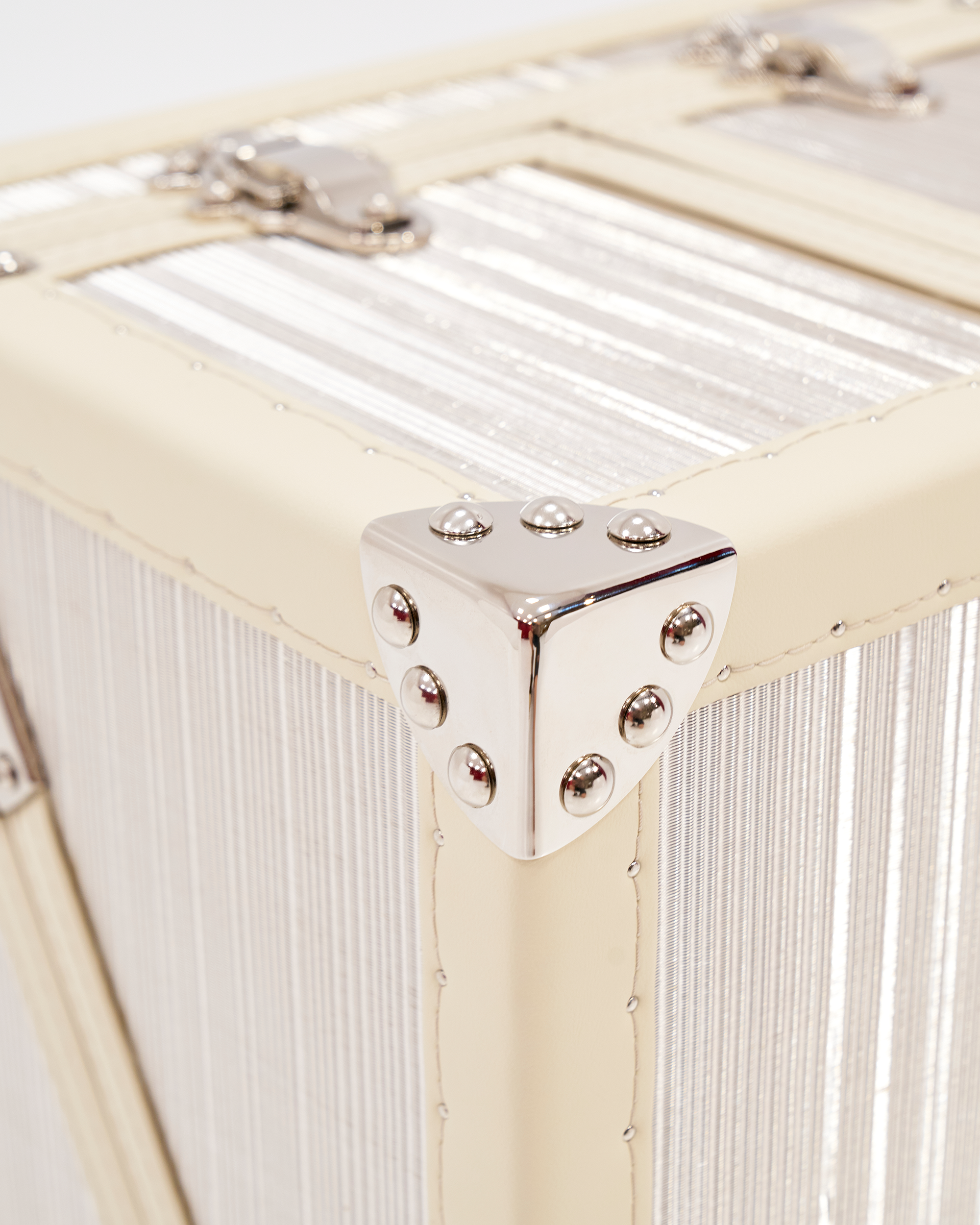 Velvet-lined interior of the SIRAE Aurum Loom frosted silver necklace display case, styled for luxury storage