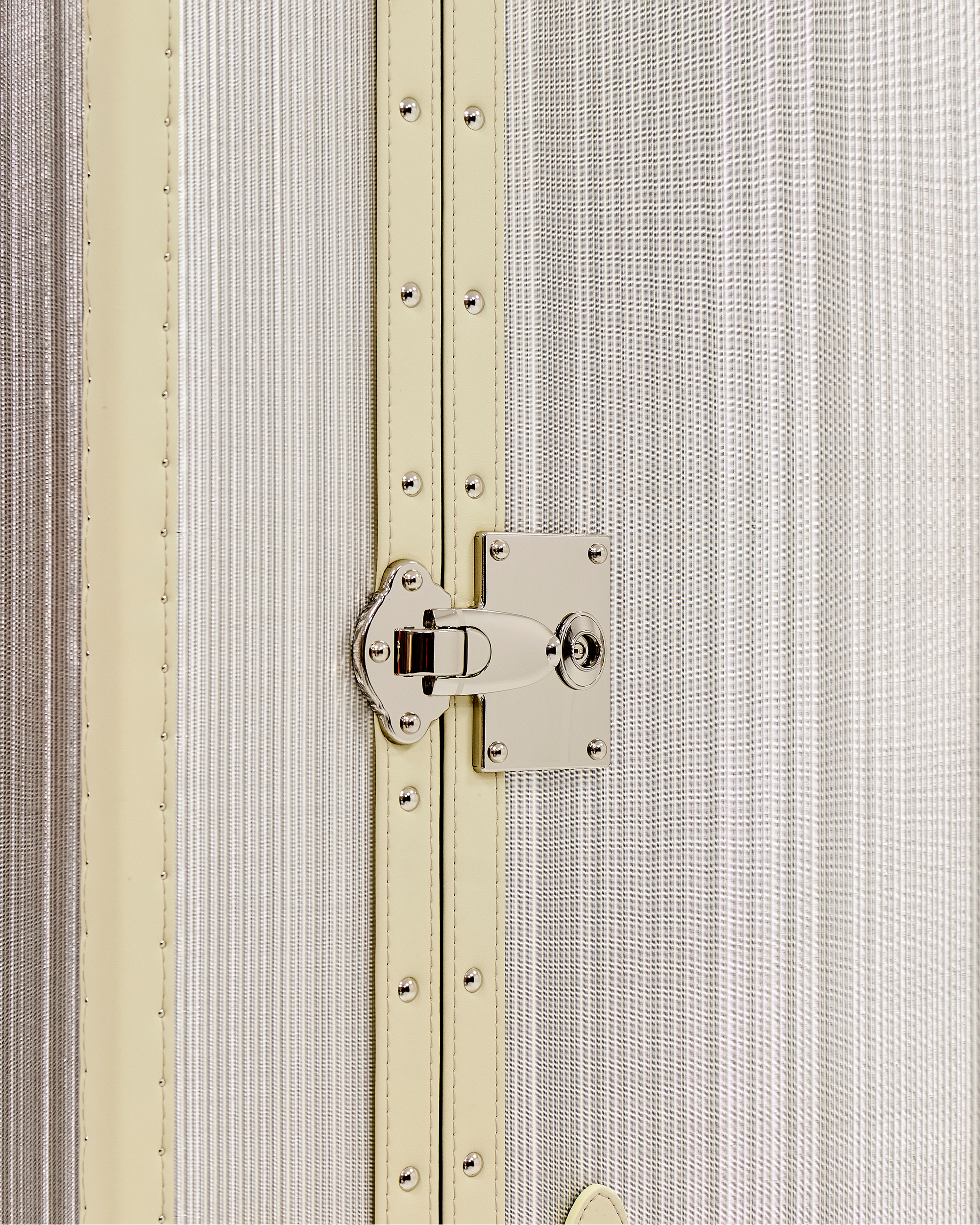 Side view of the SIRAE Aurum Loom light gold vanity cabinet in a luxury Dubai setting