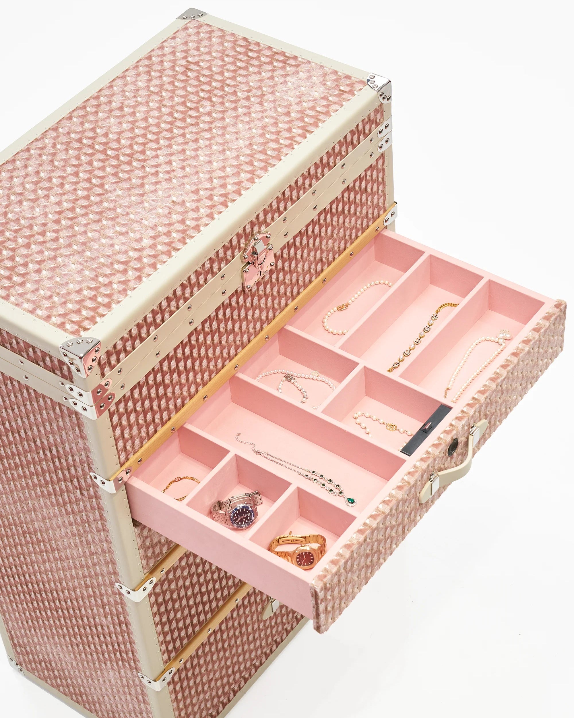 Side view of the SIRAE Ciselé Velvet blush atelier jewelry trunk in a luxury Dubai setting