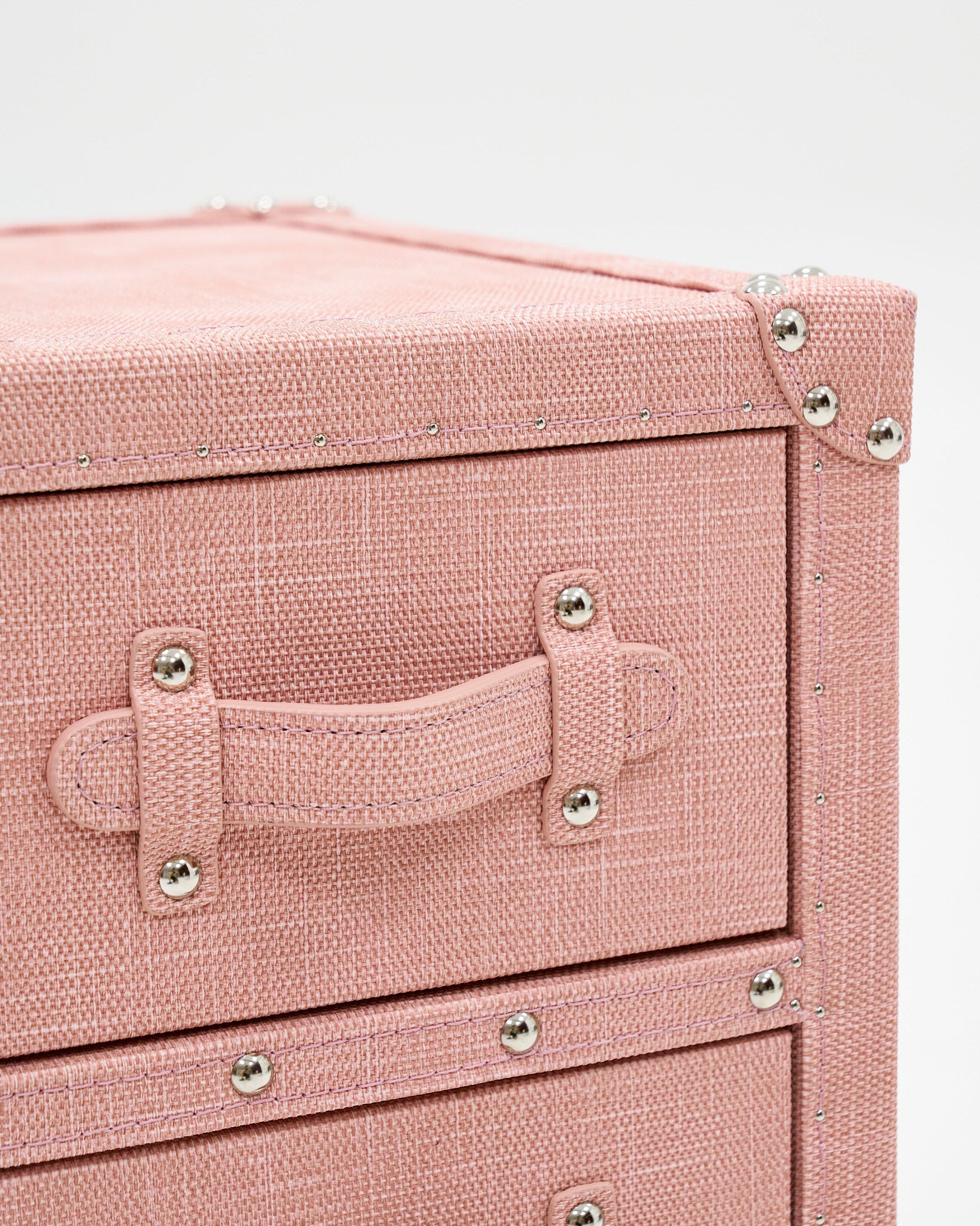 Side view of the SIRAE Heritage Luxe blossom pink compact storage in a luxury Dubai setting