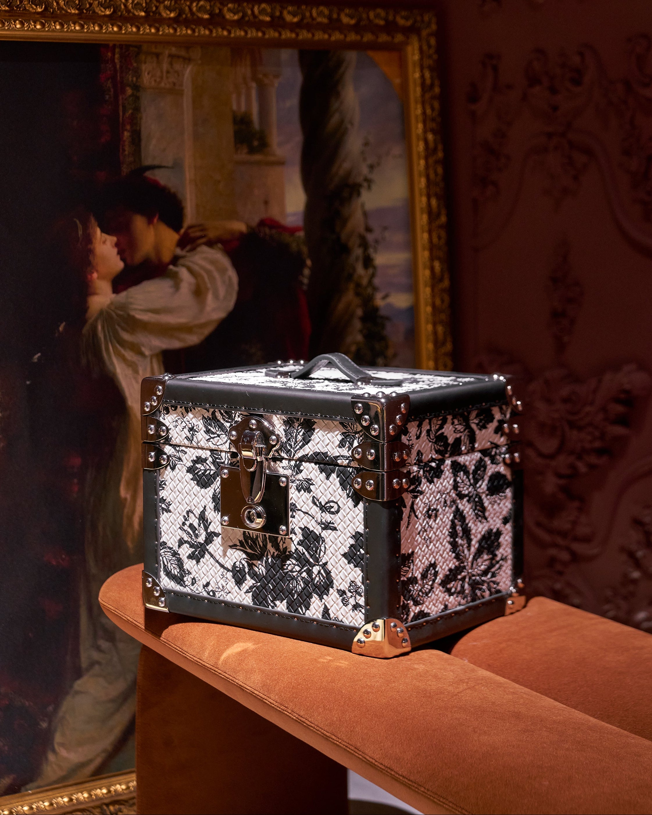 SIRAE Heritage Luxe monochrome hand-carry case styled with jewelry in a luxury Dubai interior