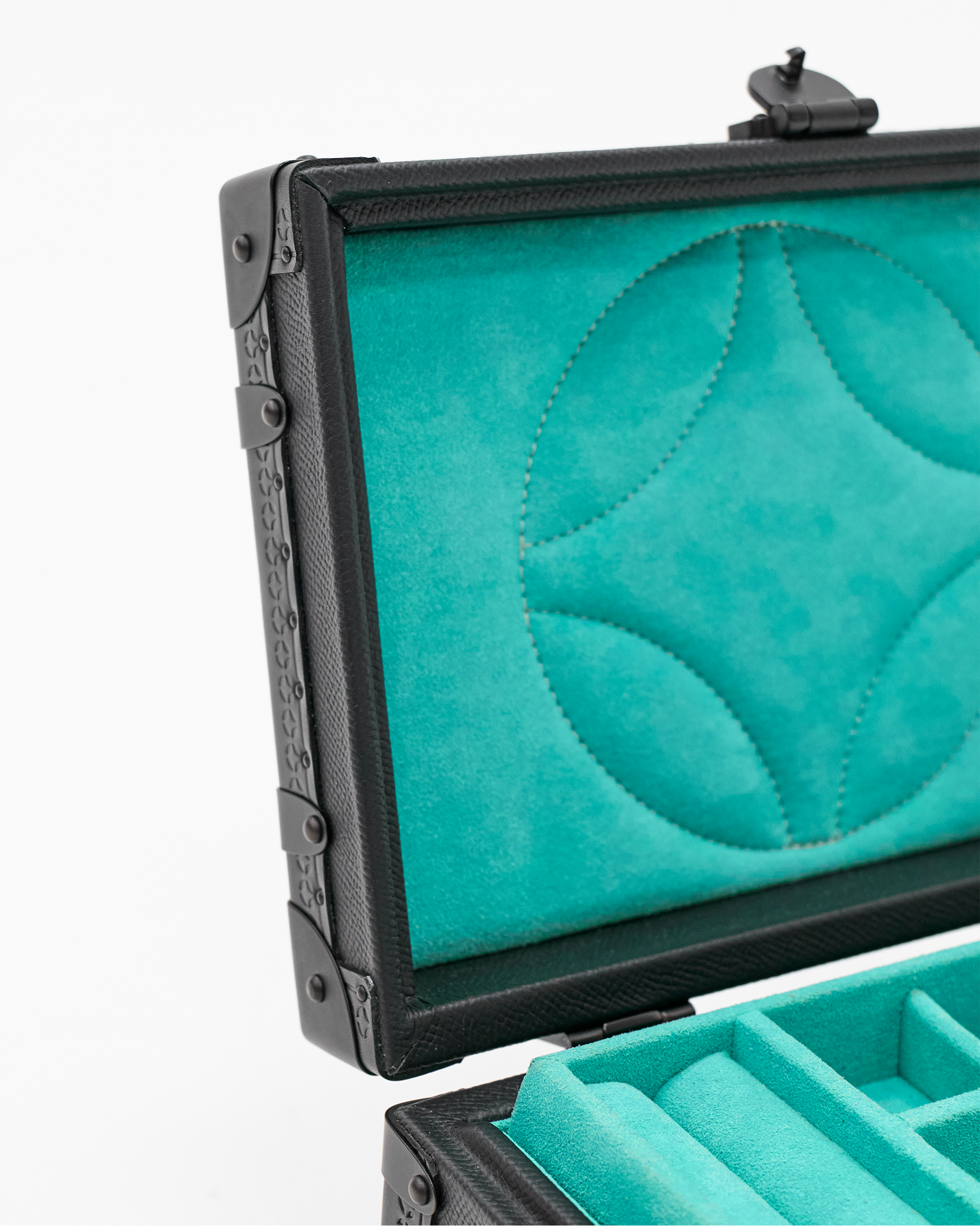 Velvet-lined interior of the SIRAE Heritage Luxe noir jewelry box, styled for luxury storage