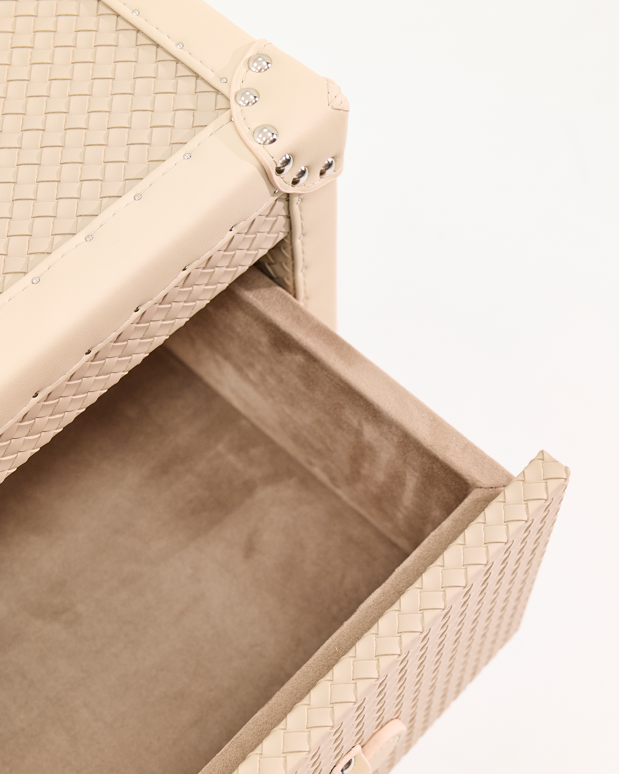 SIRAE Heritage Luxe beige side cabinet styled with jewelry in a luxury Dubai interior
