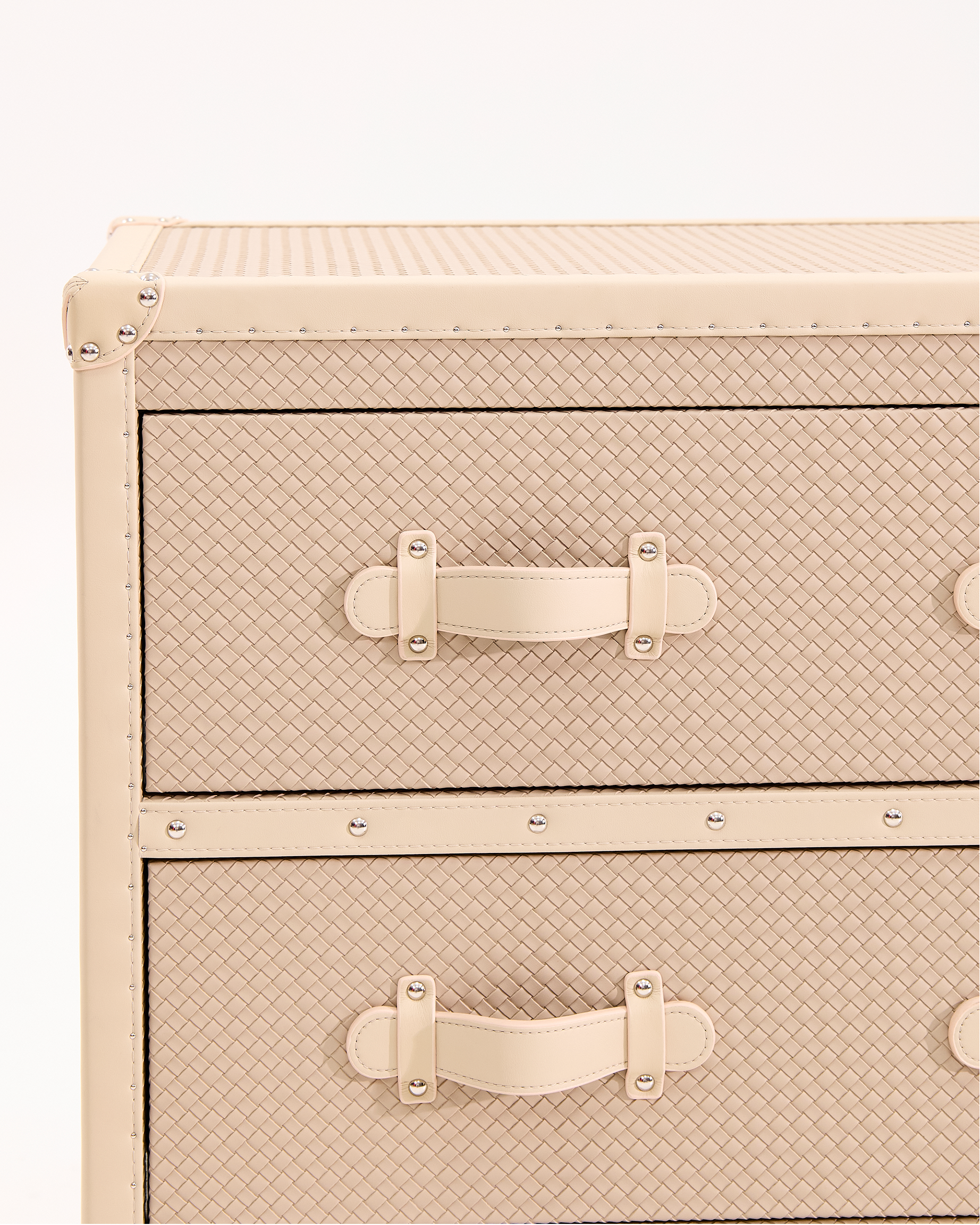Embossed leather texture detail on the SIRAE beige side cabinet