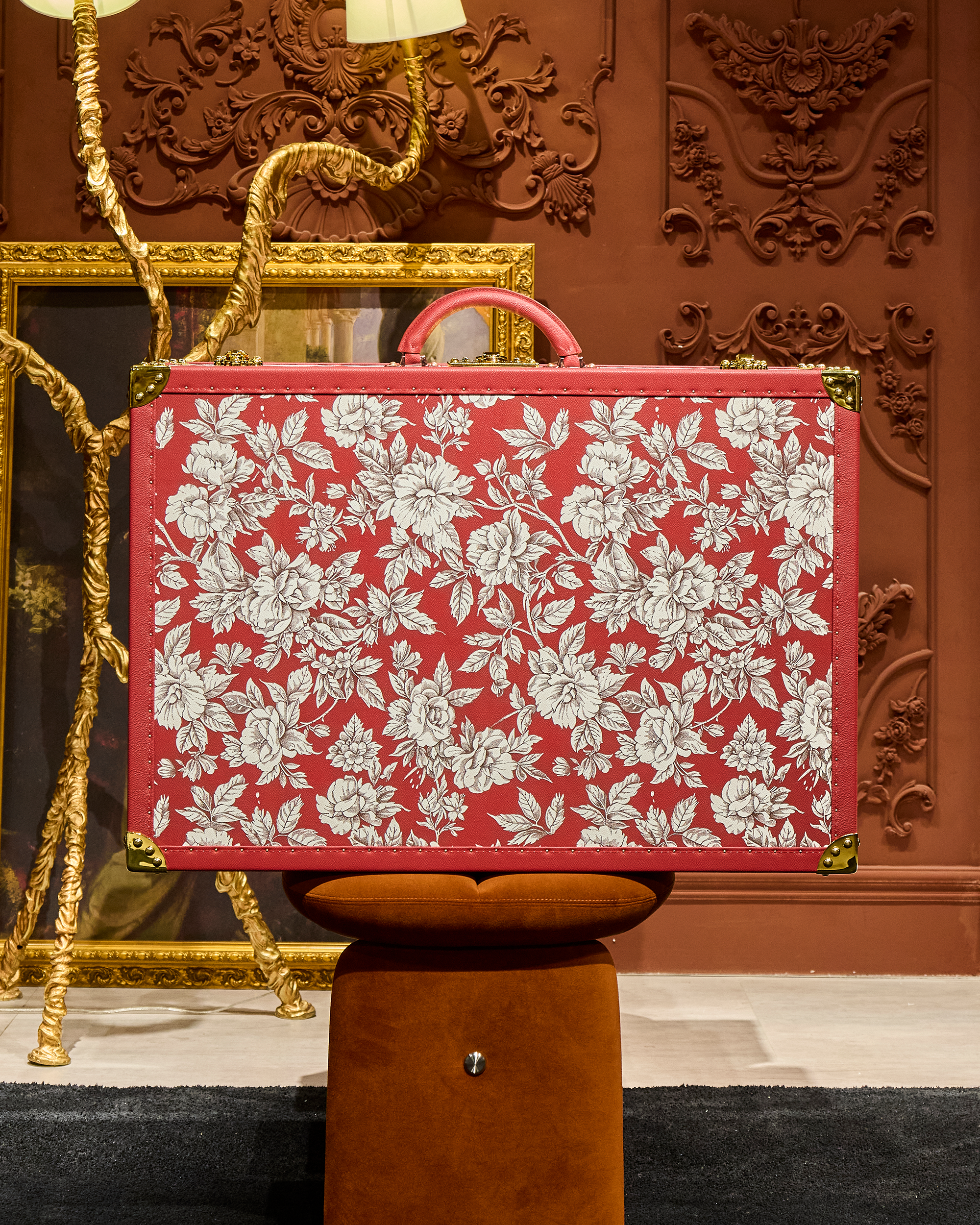 Open view of the red glass tower case by SIRAE Dubai, showing luxury tower case