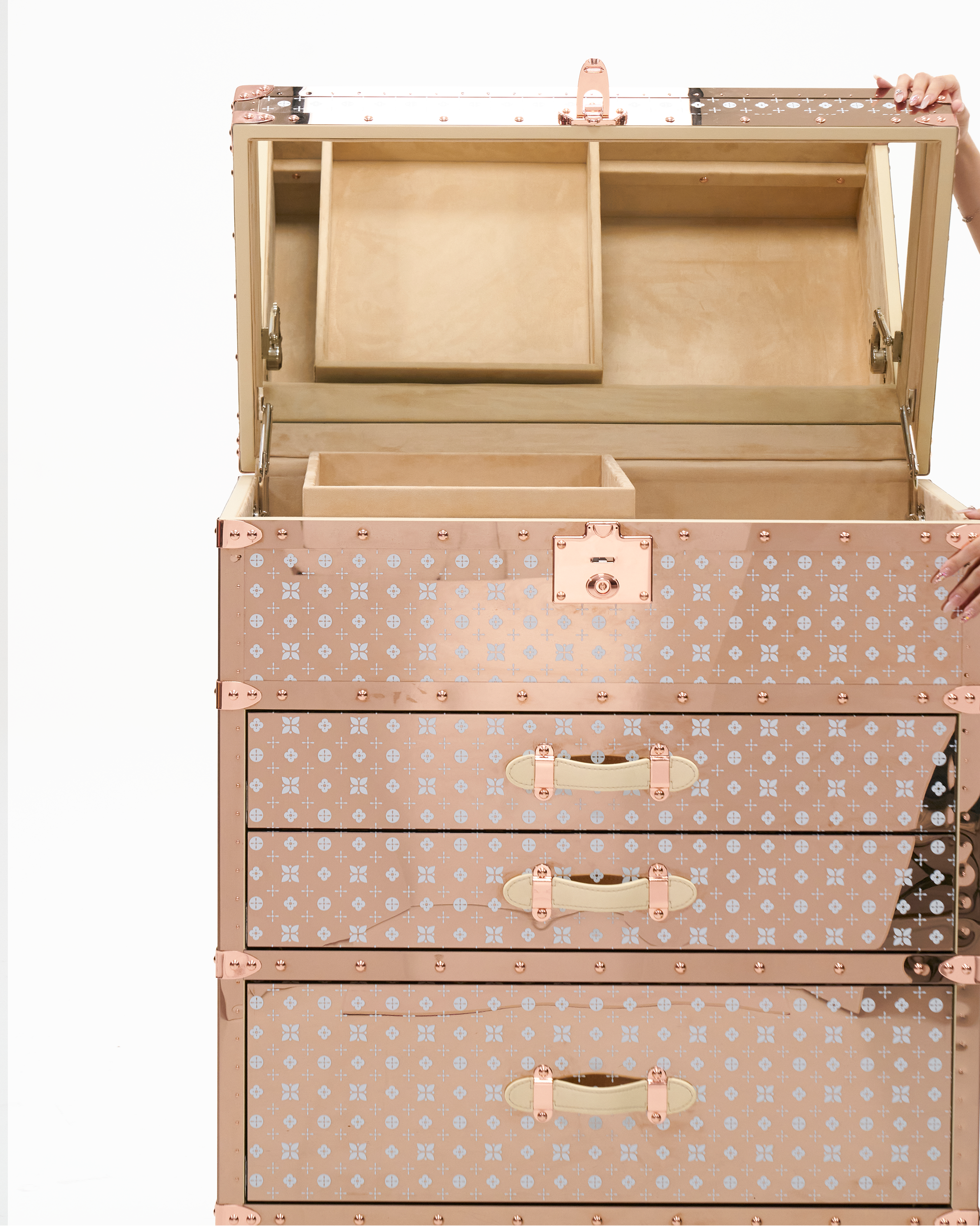 Open view of the rose gold jewelry trunk by SIRAE Dubai, showing biometric jewelry cabinet