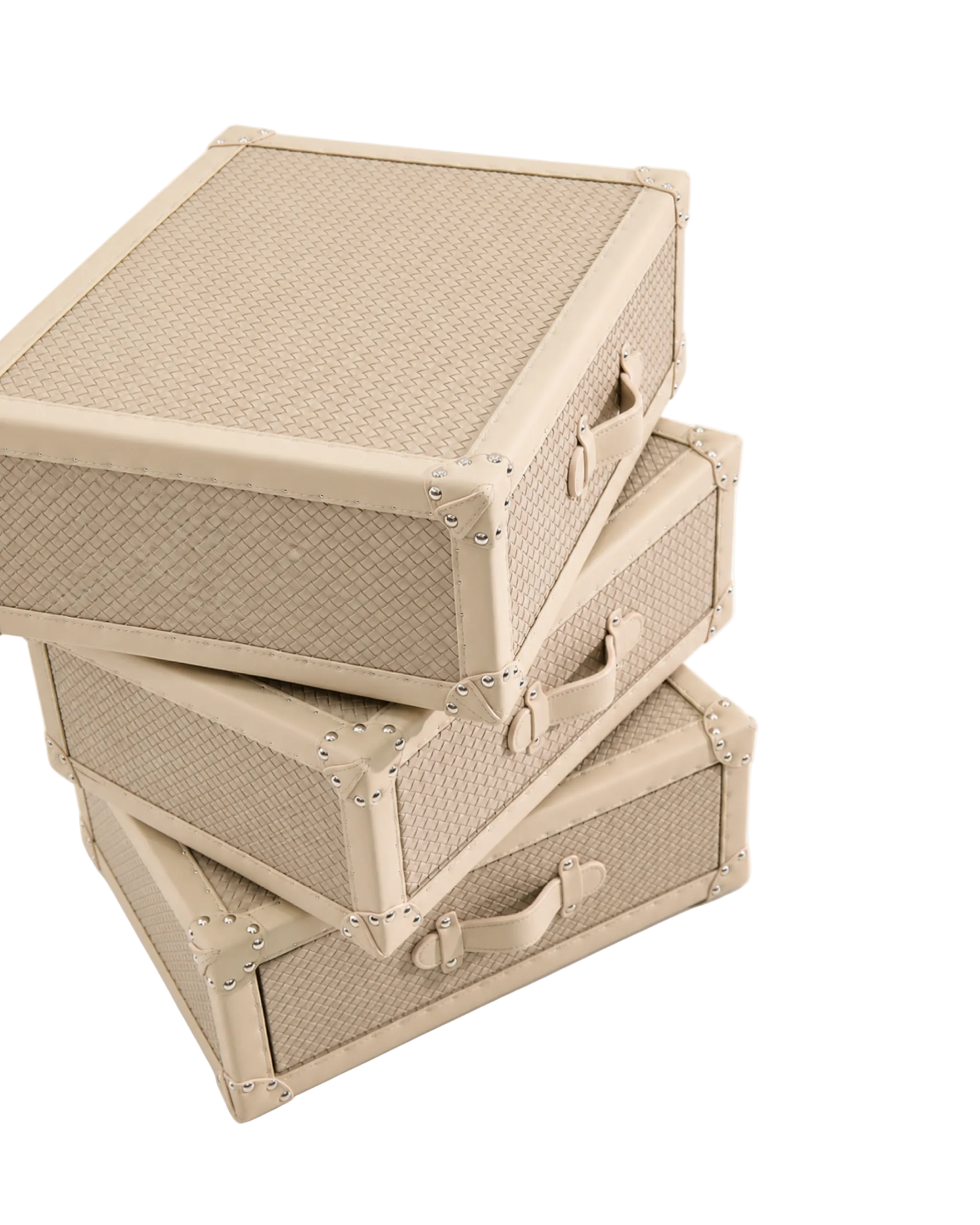 Three stacked vintage-style woven storage cases in a light beige color, featuring textured woven fronts, cream trim, and metal corner protectors, set against a plain white background.