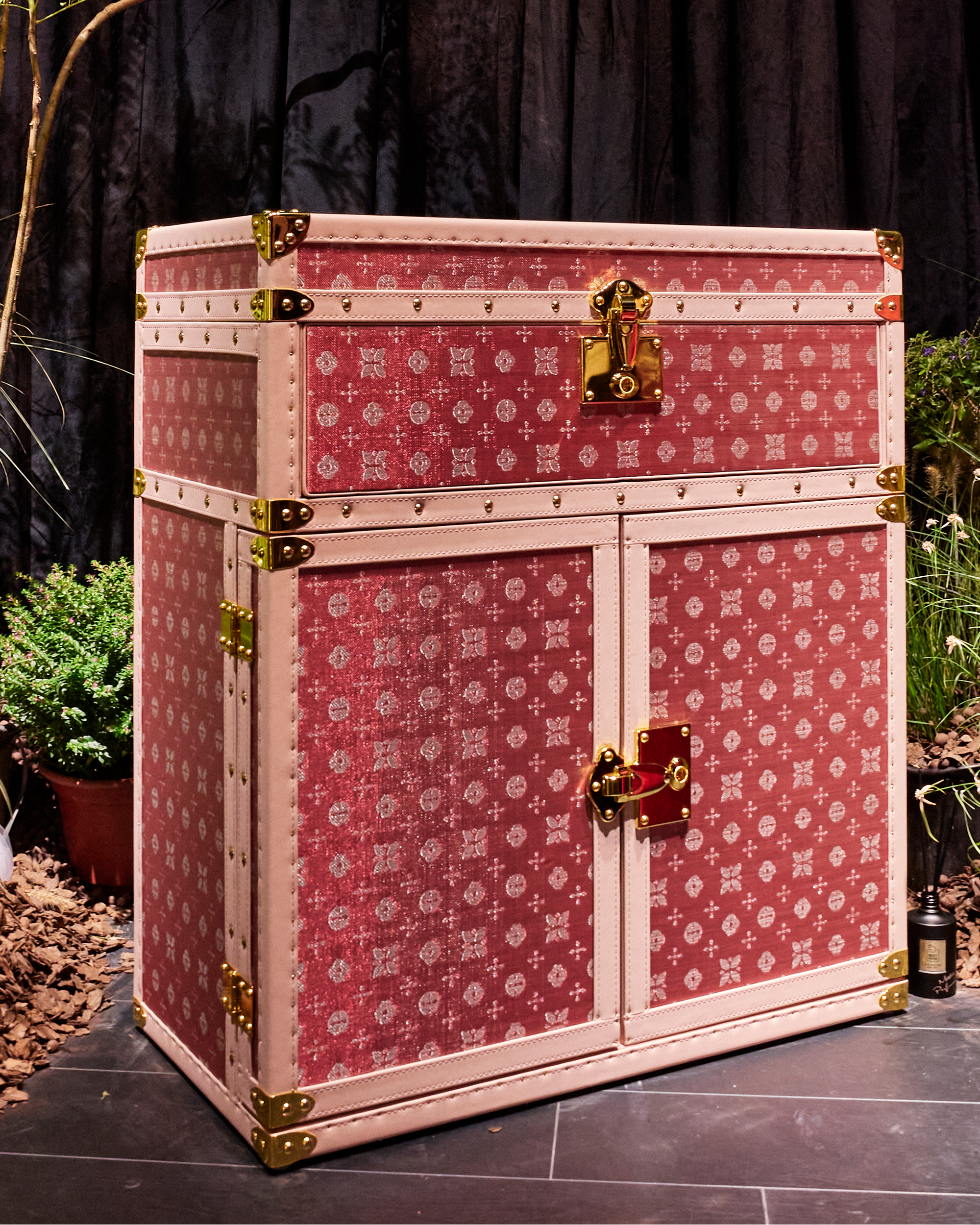 Blossom pink microfiber leather tea bar cabinet styled in a luxury Dubai interior by SIRAE