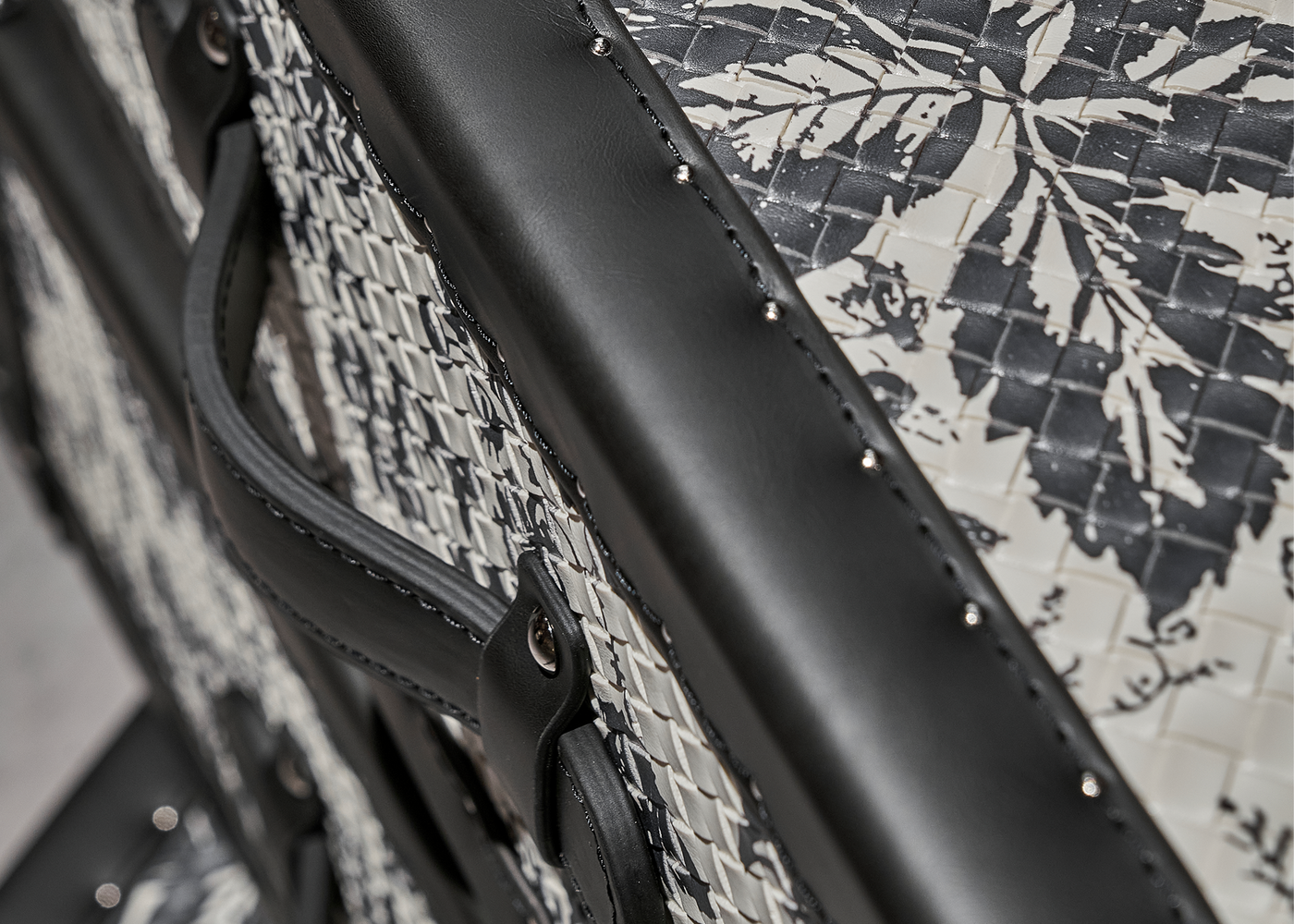 Hand-stitched full-grain leather detail on the monochrome chest of drawers, SIRAE Casa Dubai