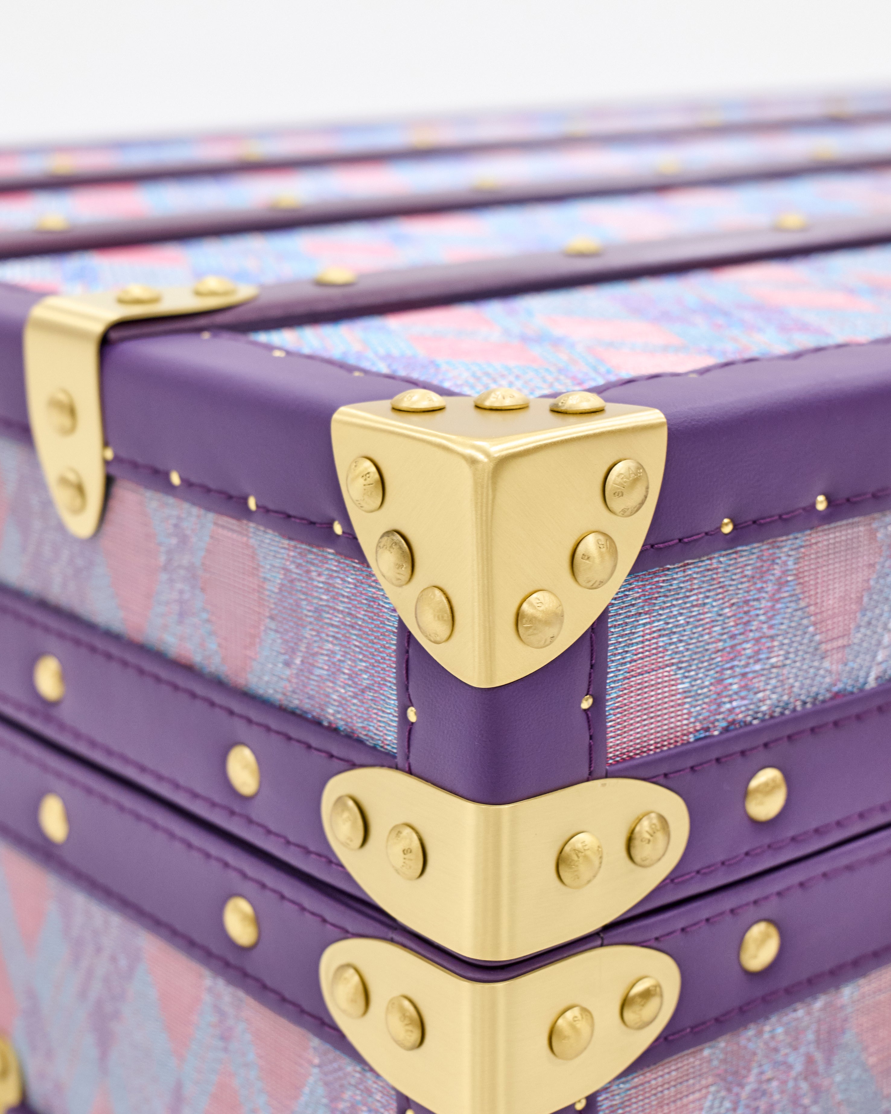 Microfiber leather detail of the amethyst microfiber leather storage trunk coffee table, SIRAE Dubai