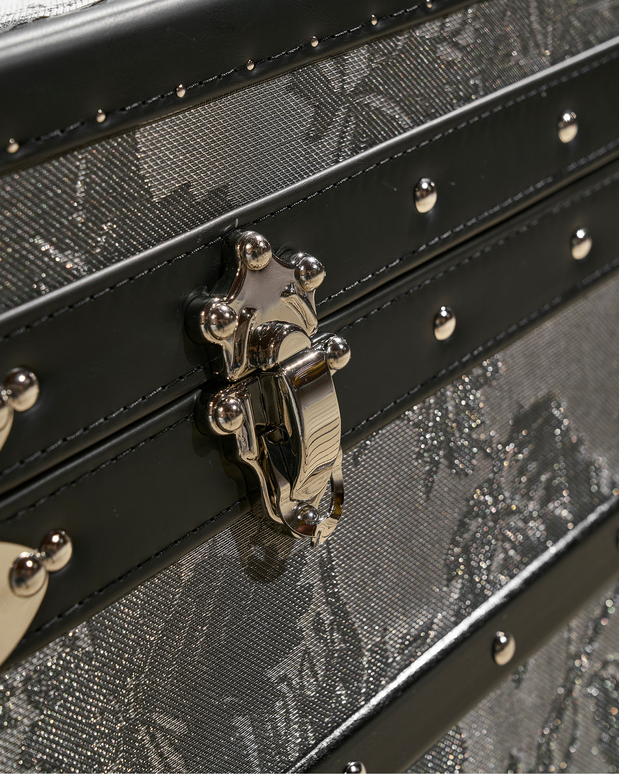 Microfiber leather detail of the monochrome microfiber leather storage trunk coffee table, SIRAE Dubai