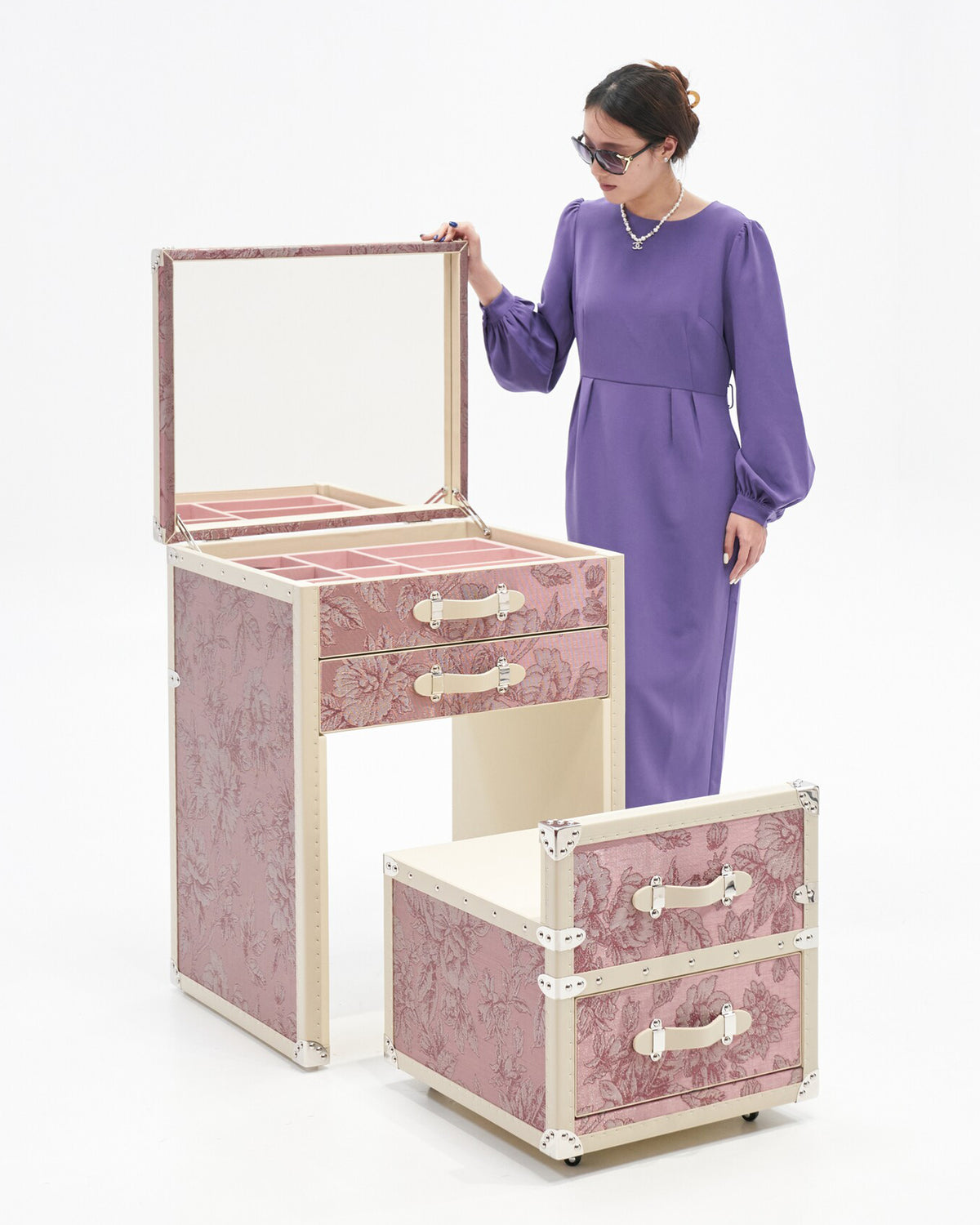 Rose toile dressing table trunk with mirror styled in an interior