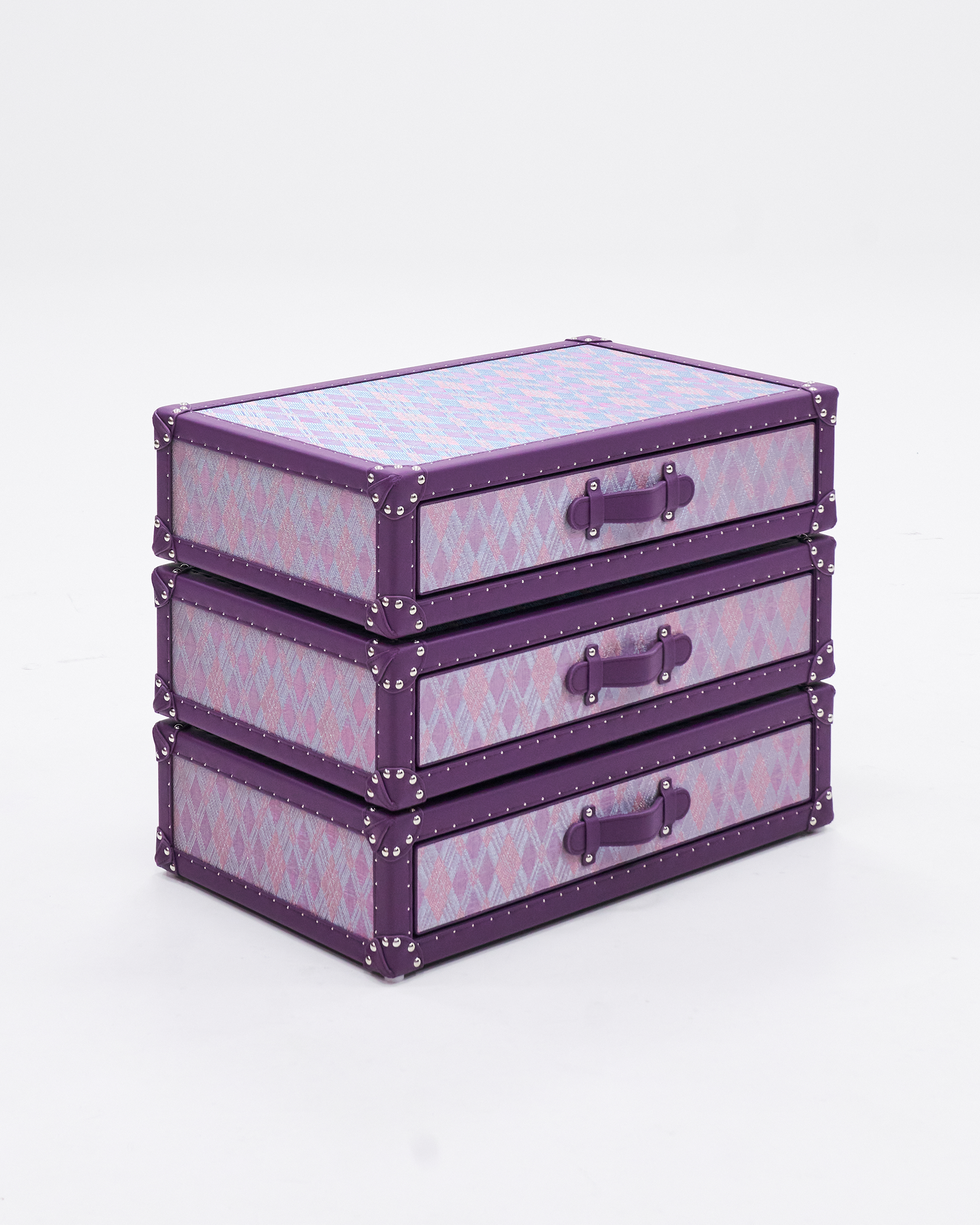 Suede-lined drawer interior of the SIRAE anemone purple copper-wire rotating cabinet
